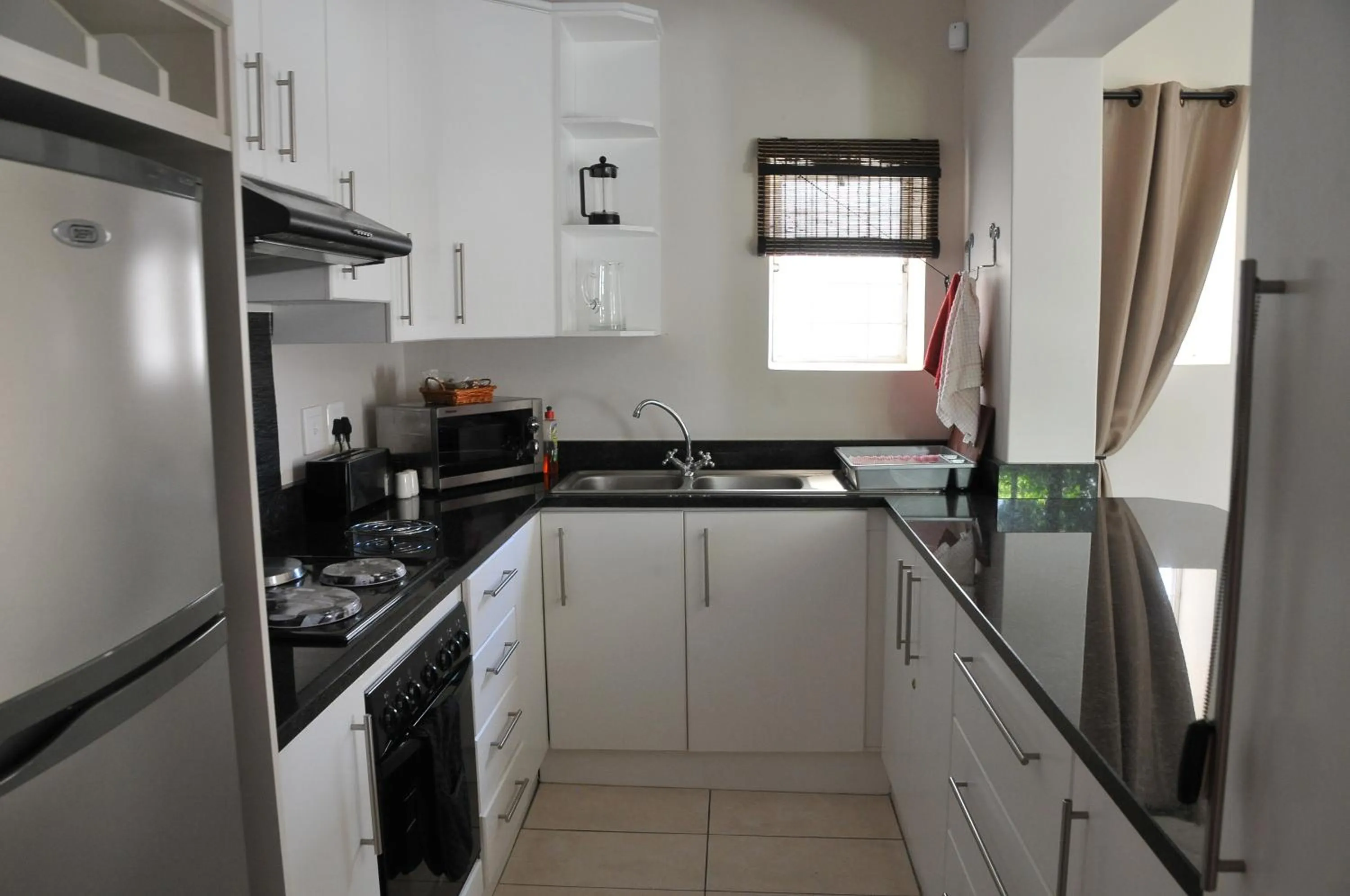 Kitchen or kitchenette in A&A Guesthouse