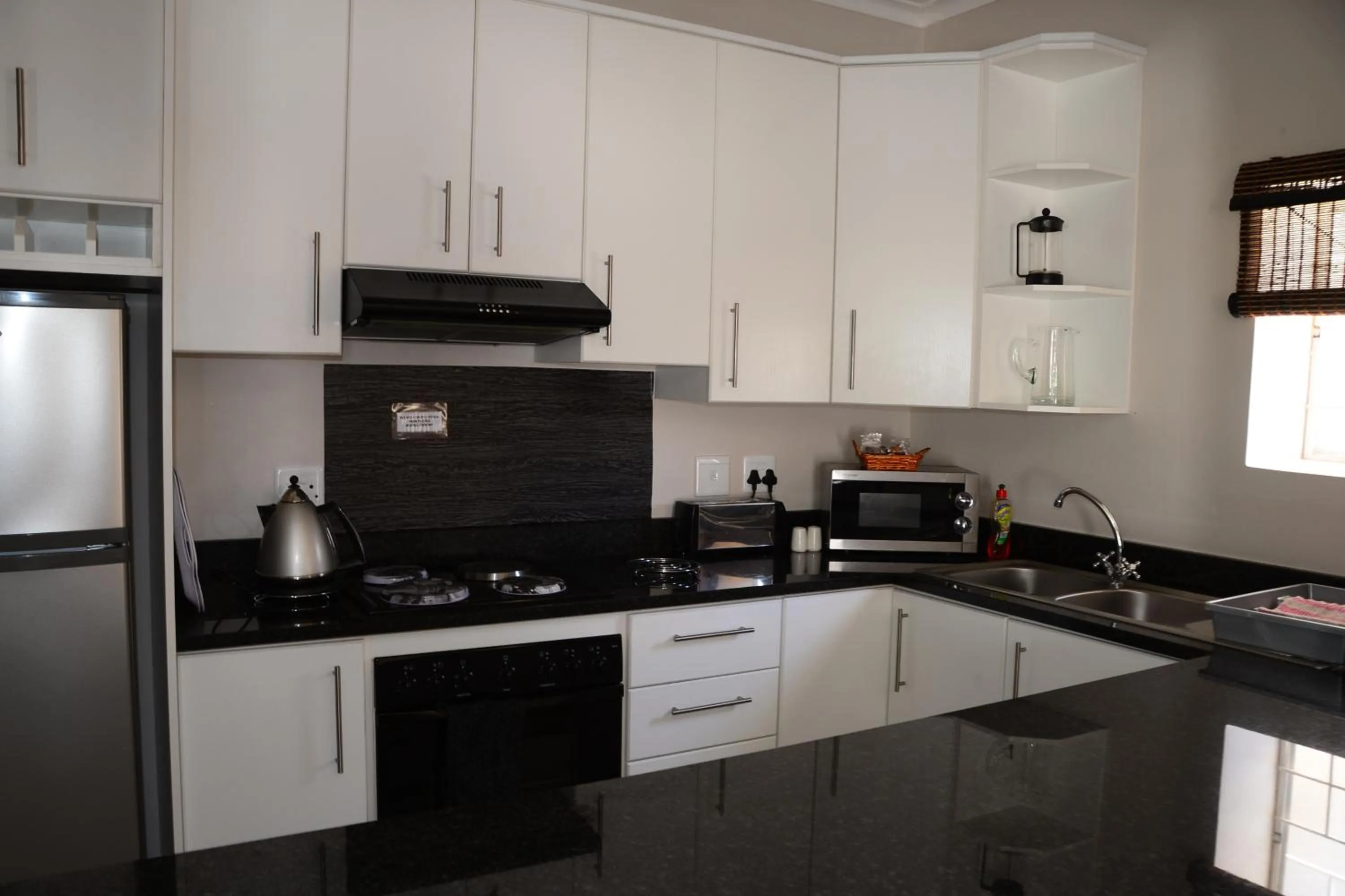 Kitchen or kitchenette in A&A Guesthouse