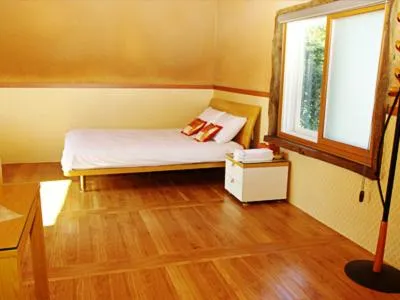 Photo of the whole room, Bed in Angkure Pension