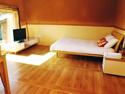 Photo of the whole room, Bed in Angkure Pension