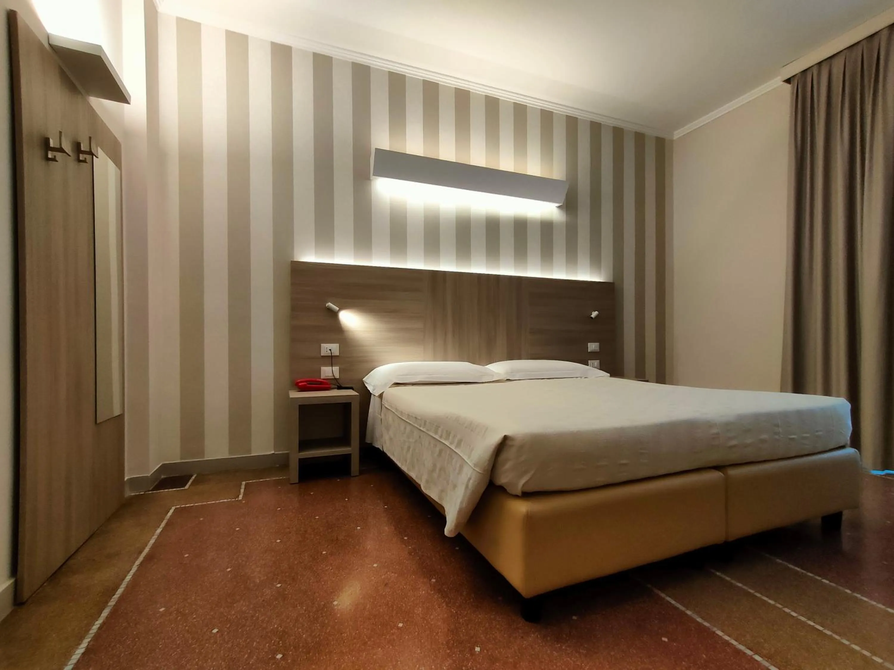 Bed in Hotel Vittoria