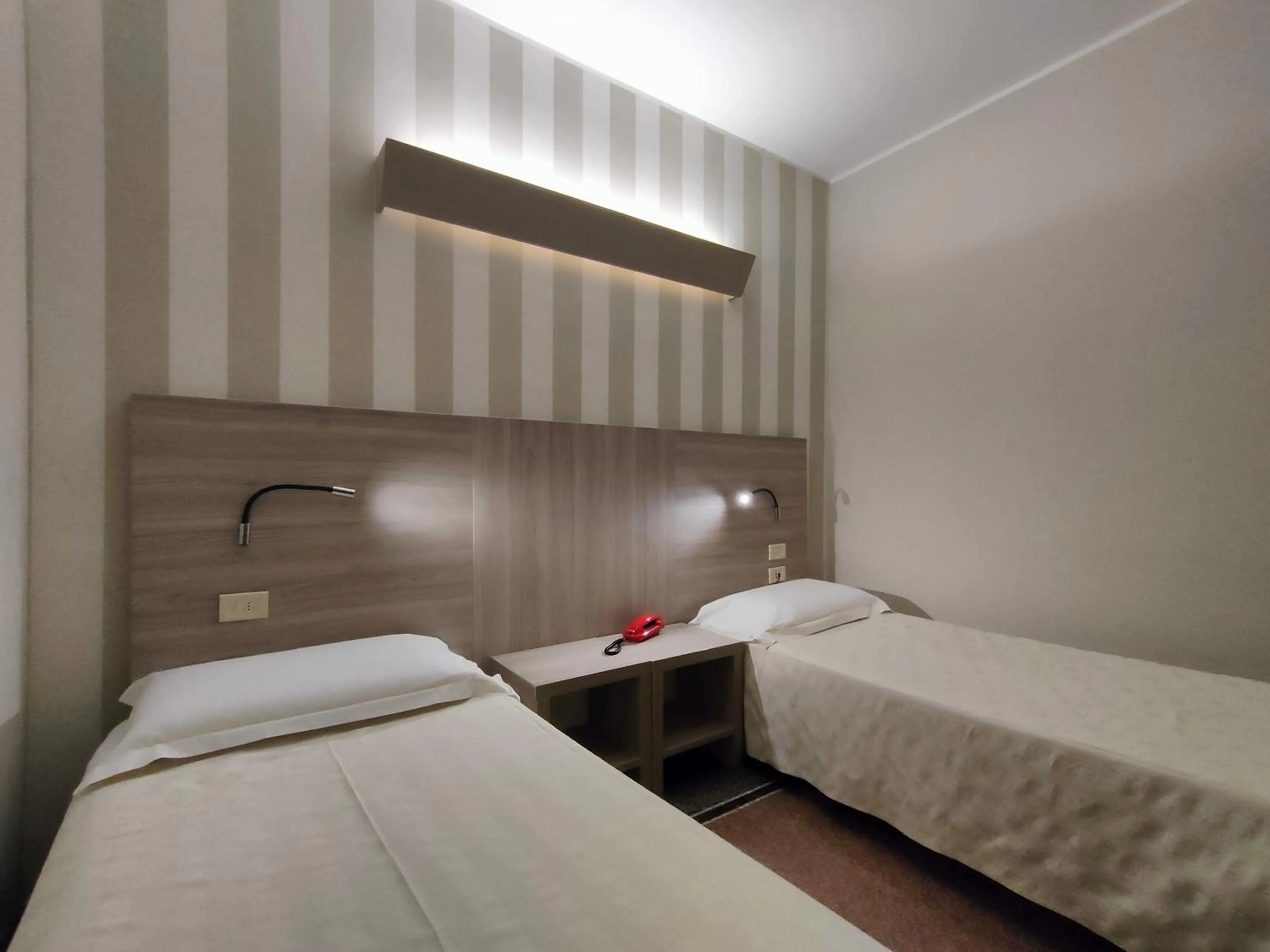 Bed in Hotel Vittoria