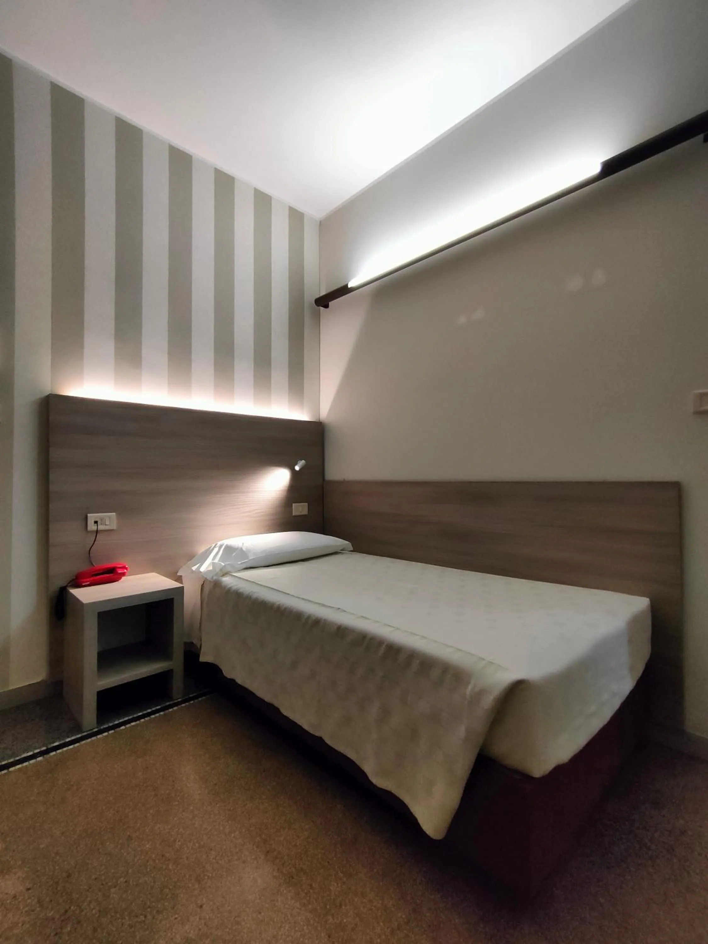 Bed in Hotel Vittoria