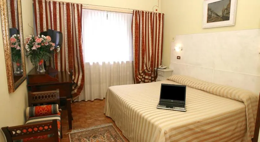 Bed in Ai Ronchi Motor Hotel Brescia