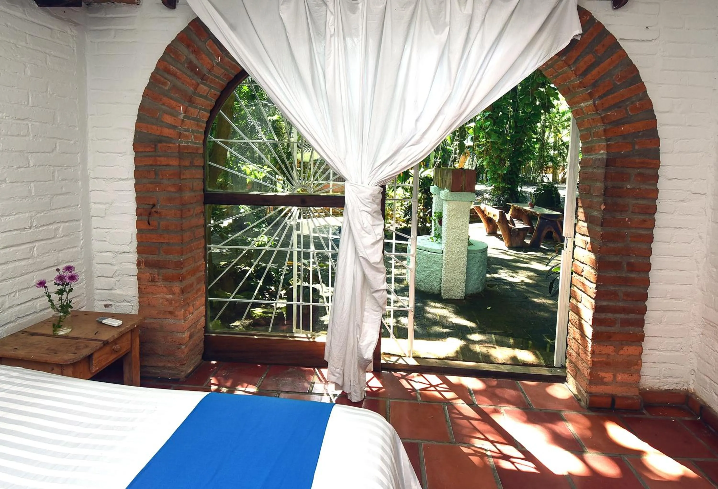 Bed in Sayulita Beach House Hotel