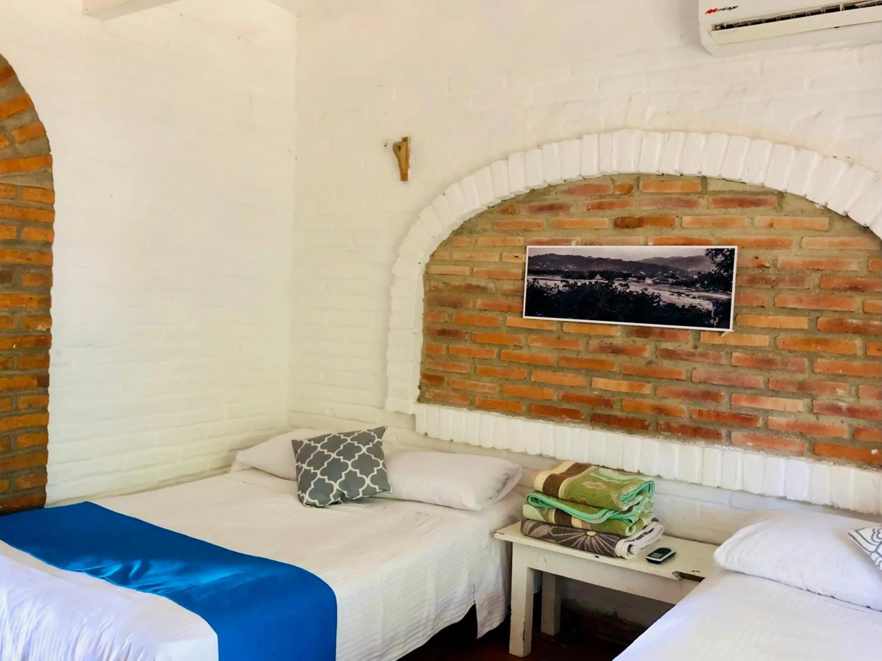 Bed in Sayulita Beach House Hotel