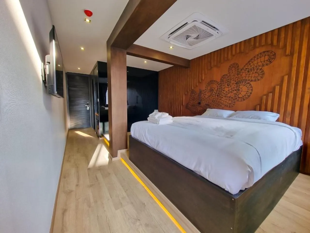 Photo of the whole room, Bed in The Nhorm Hotel Ratchada