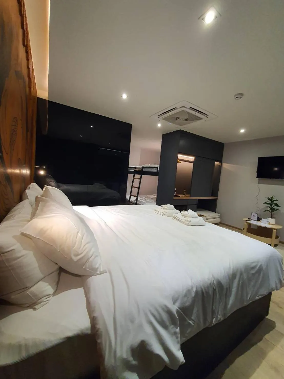 Photo of the whole room, Bed in The Nhorm Hotel Ratchada