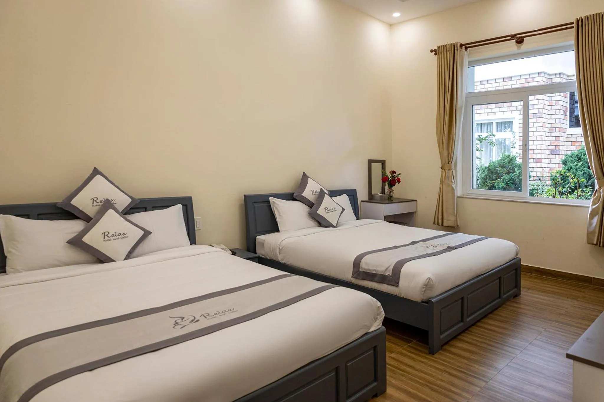 Bedroom in Relax Hotel by Ixorat