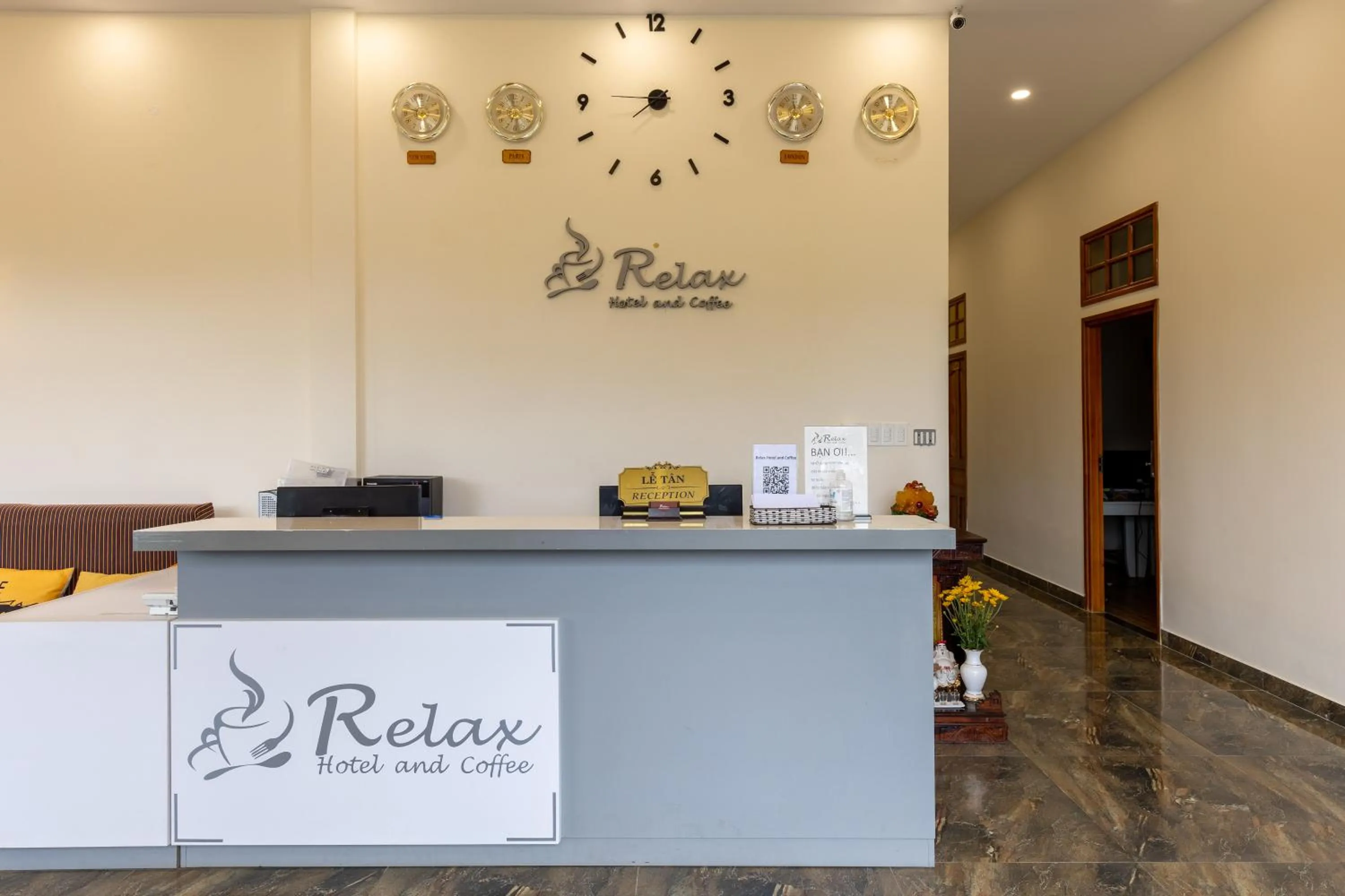 Lobby or reception in Relax Hotel by Ixorat