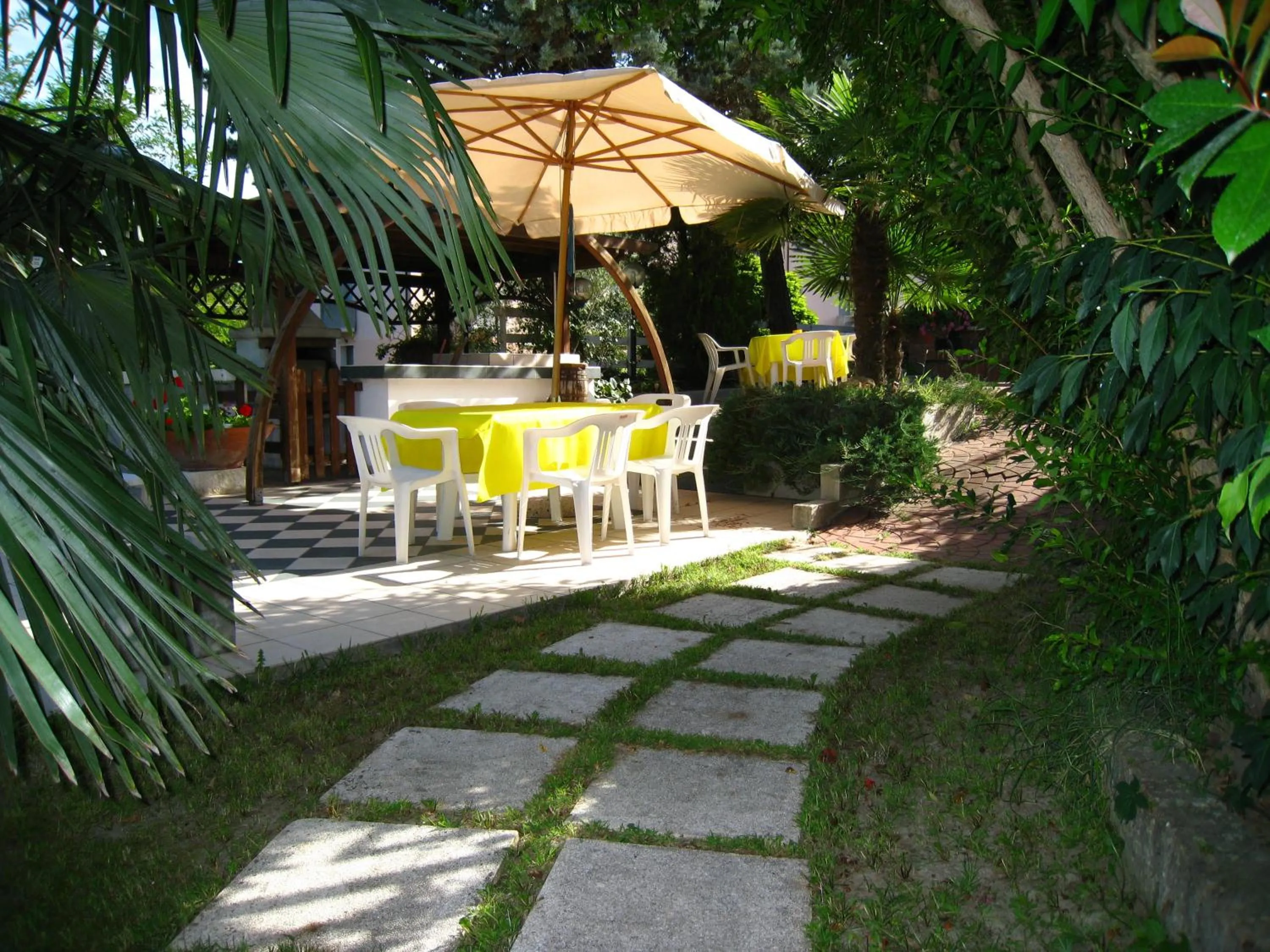 Garden in Hotel Boomerang - Check-in & Meals in front at hotel Sporting