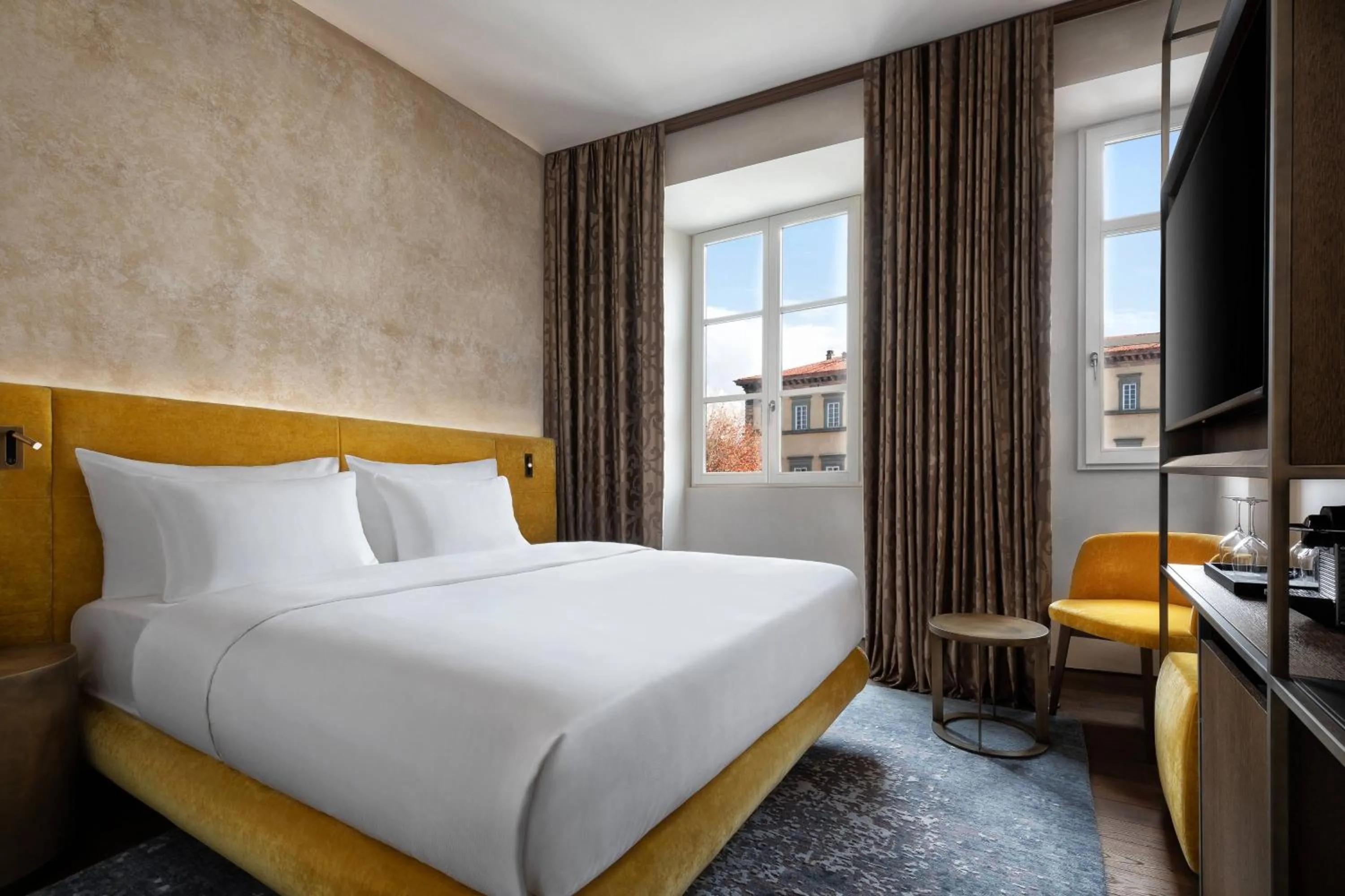 Photo of the whole room, Bed in Grand Universe Lucca, Autograph Collection