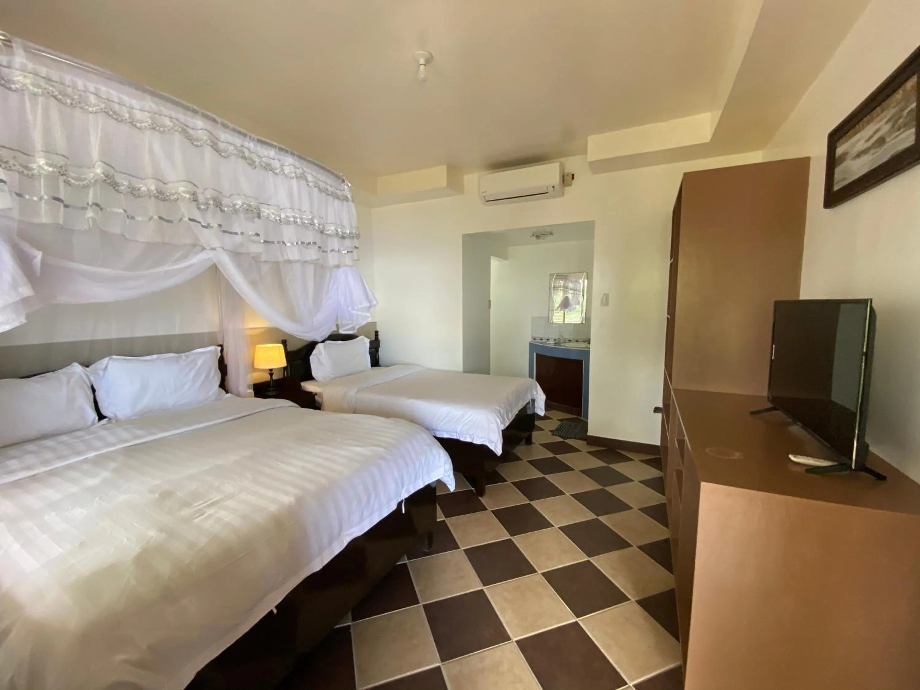 Bed in Azure Camotes Resort Hotel