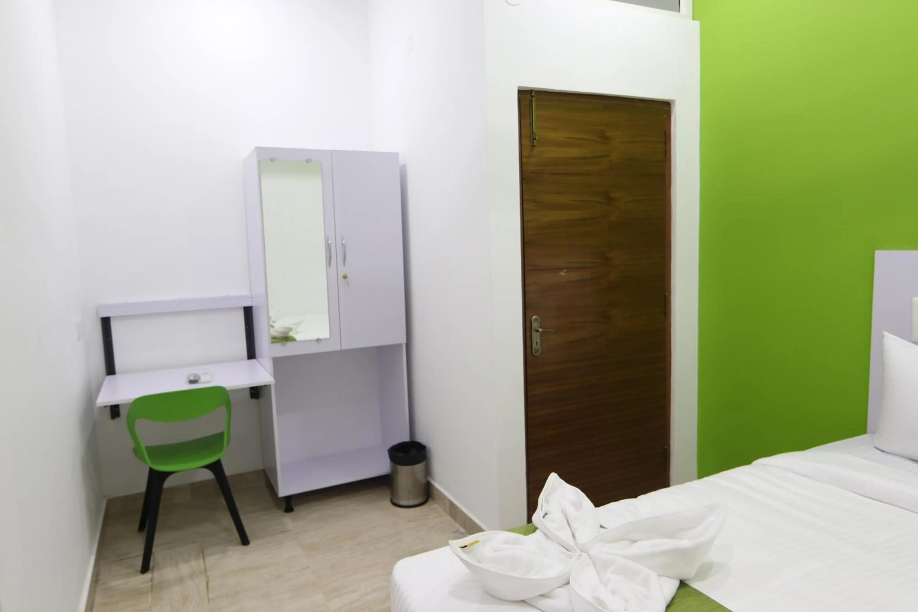 Bed in Athulya Stays