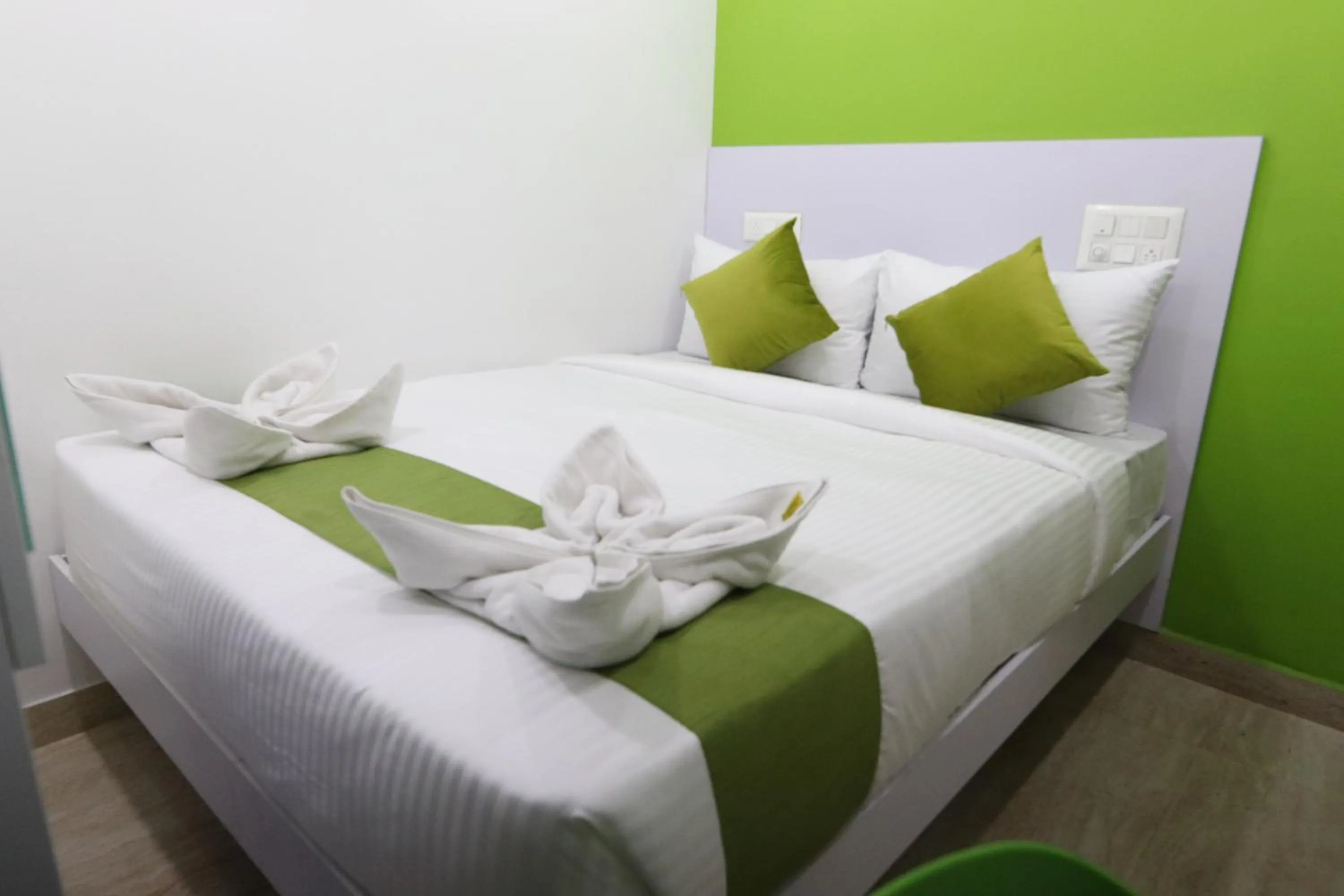 Bed in Athulya Stays