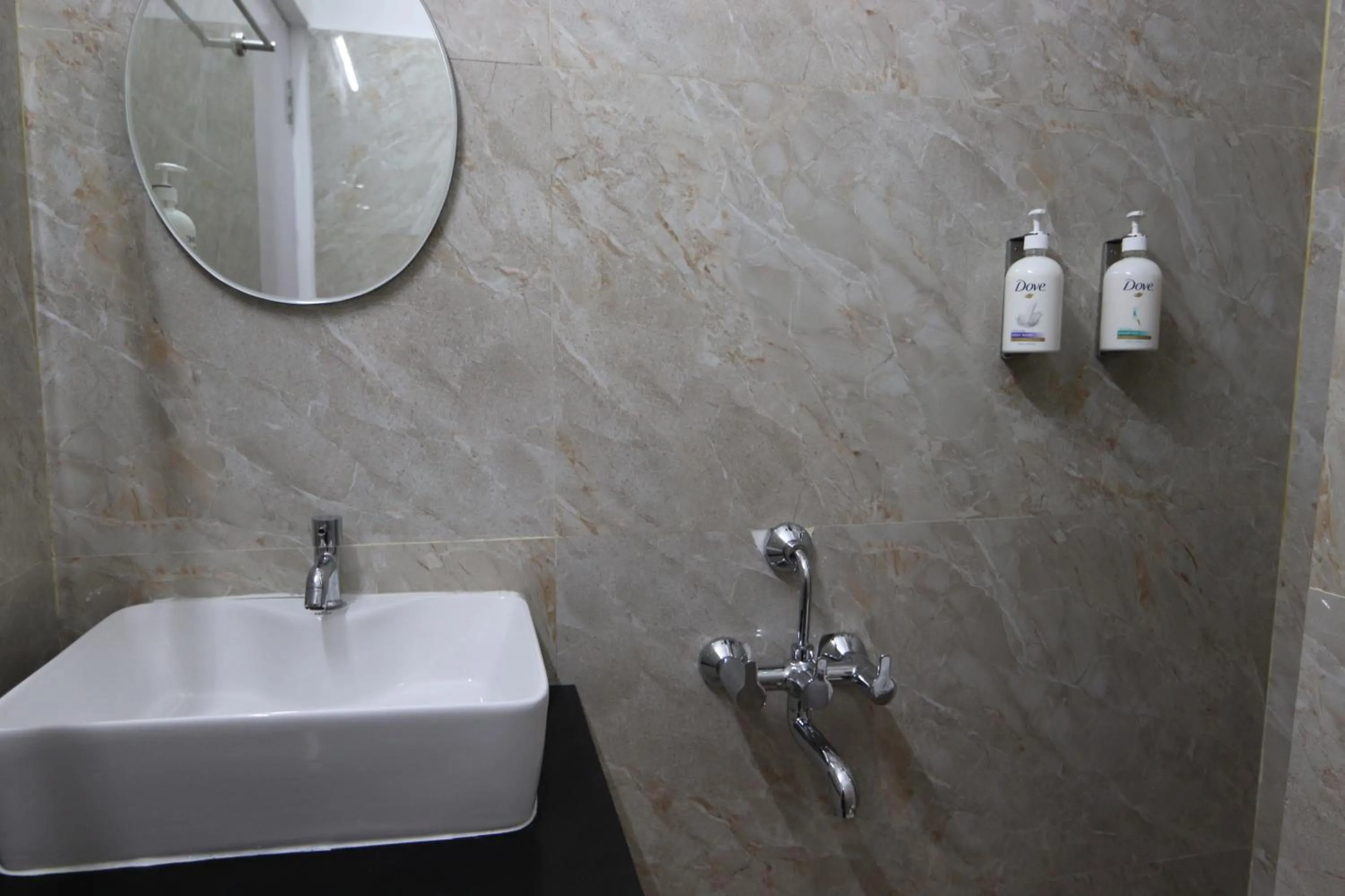 Bathroom in Athulya Stays