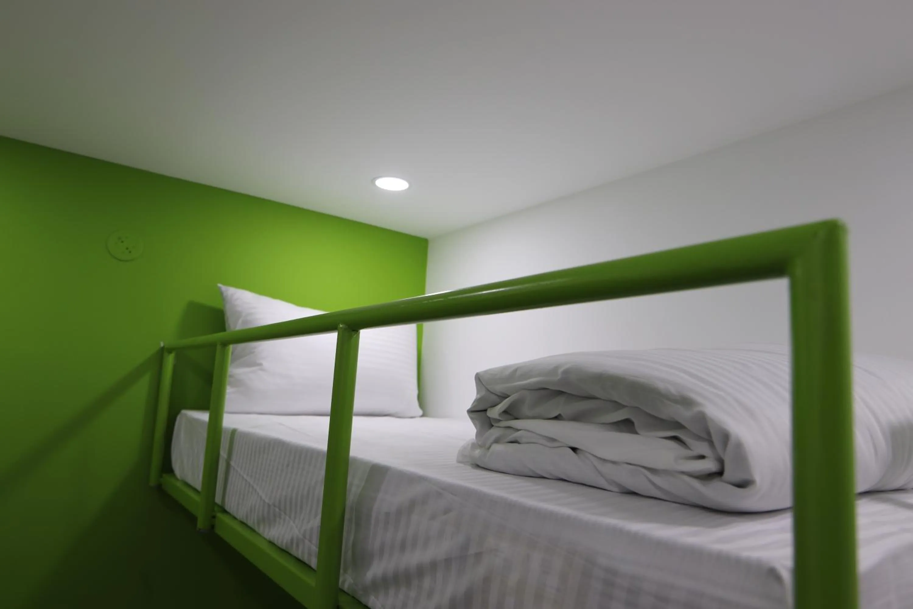 Bed in Athulya Stays