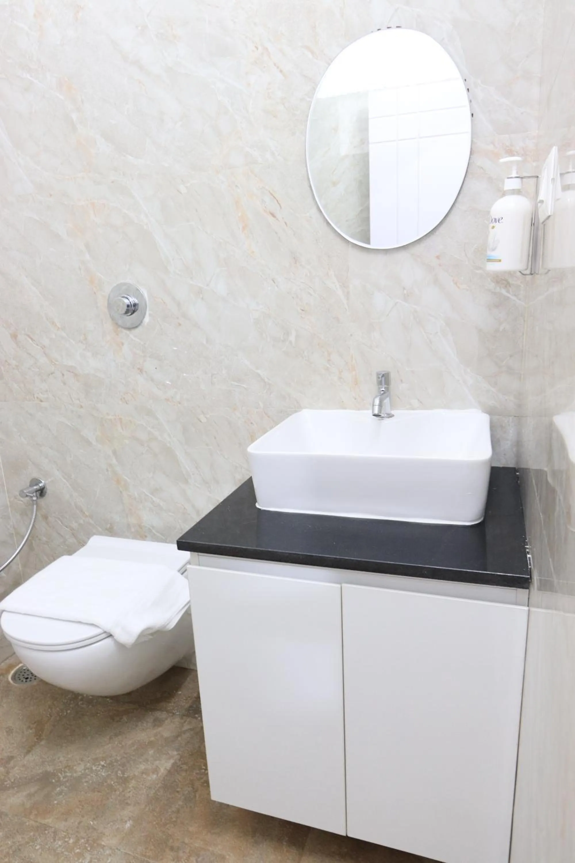 Bathroom in Athulya Stays