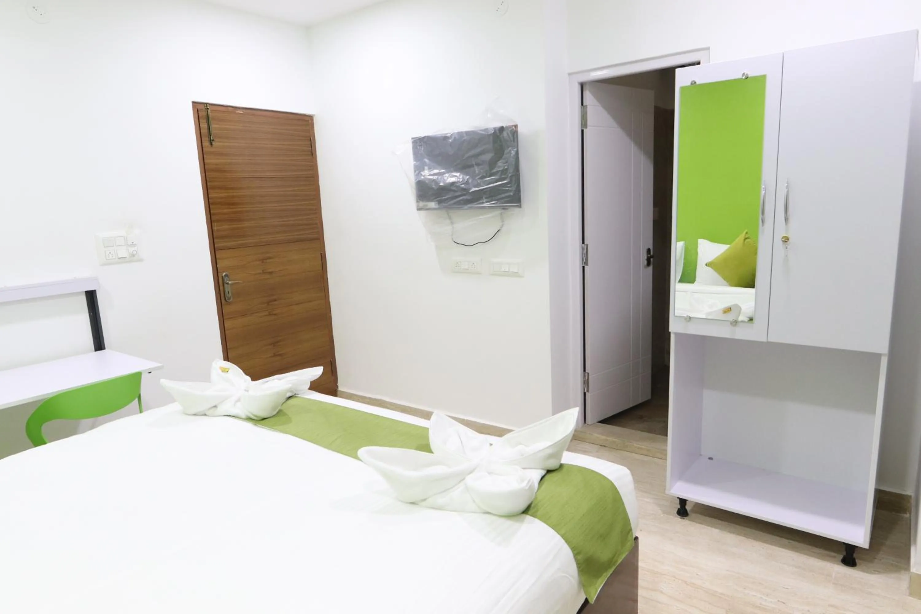 Bed in Athulya Stays