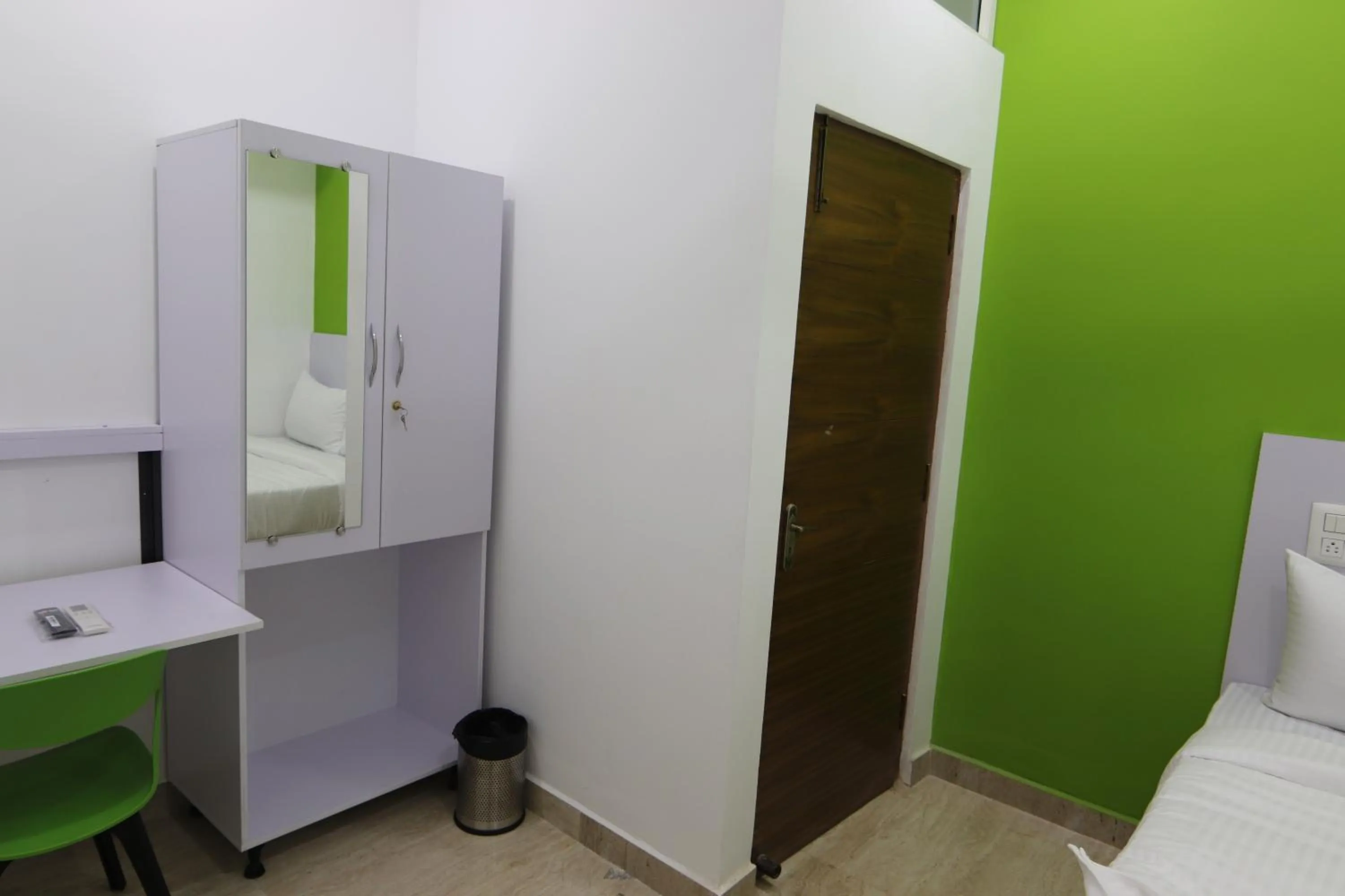 Bed in Athulya Stays