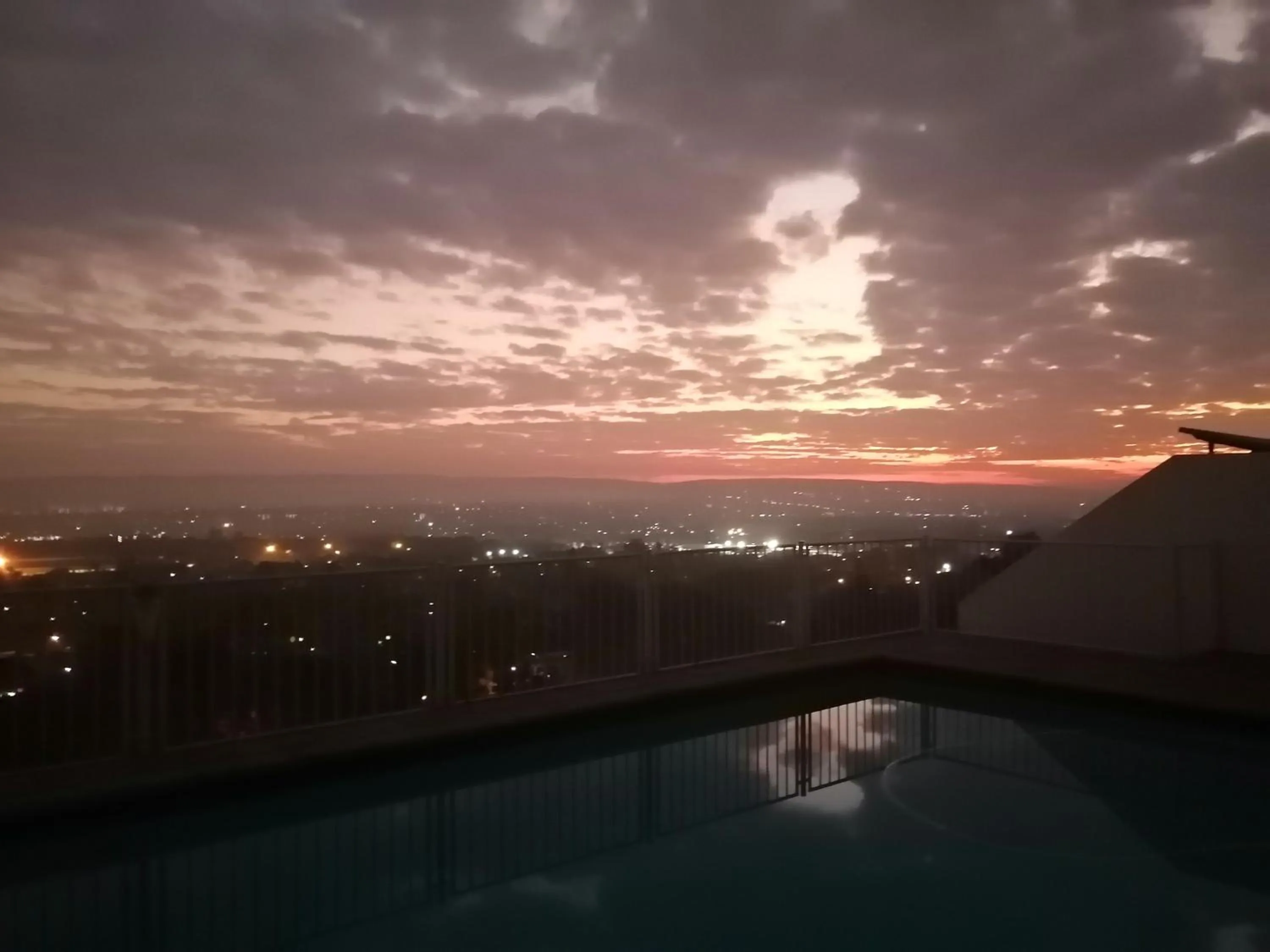 Swimming pool in Palm View Guest House