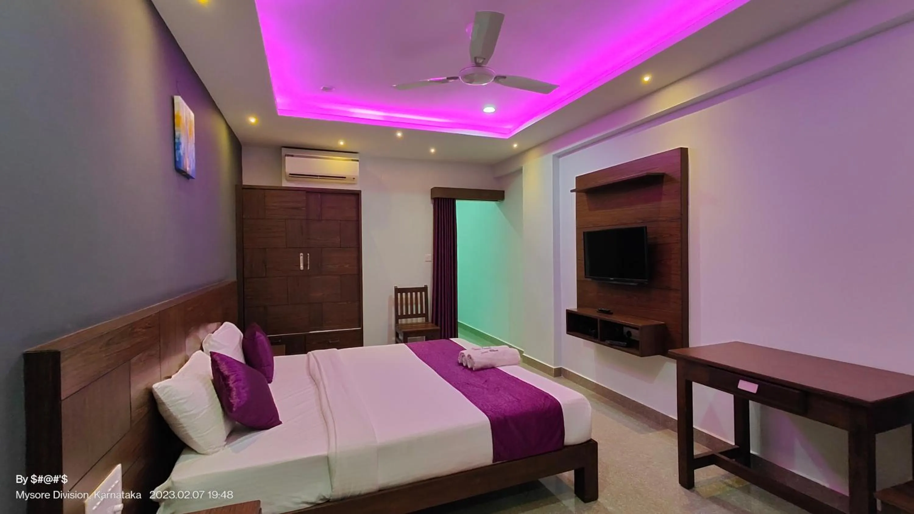 Communal lounge/ TV room, Bed in Coorg ASHOK PALACE