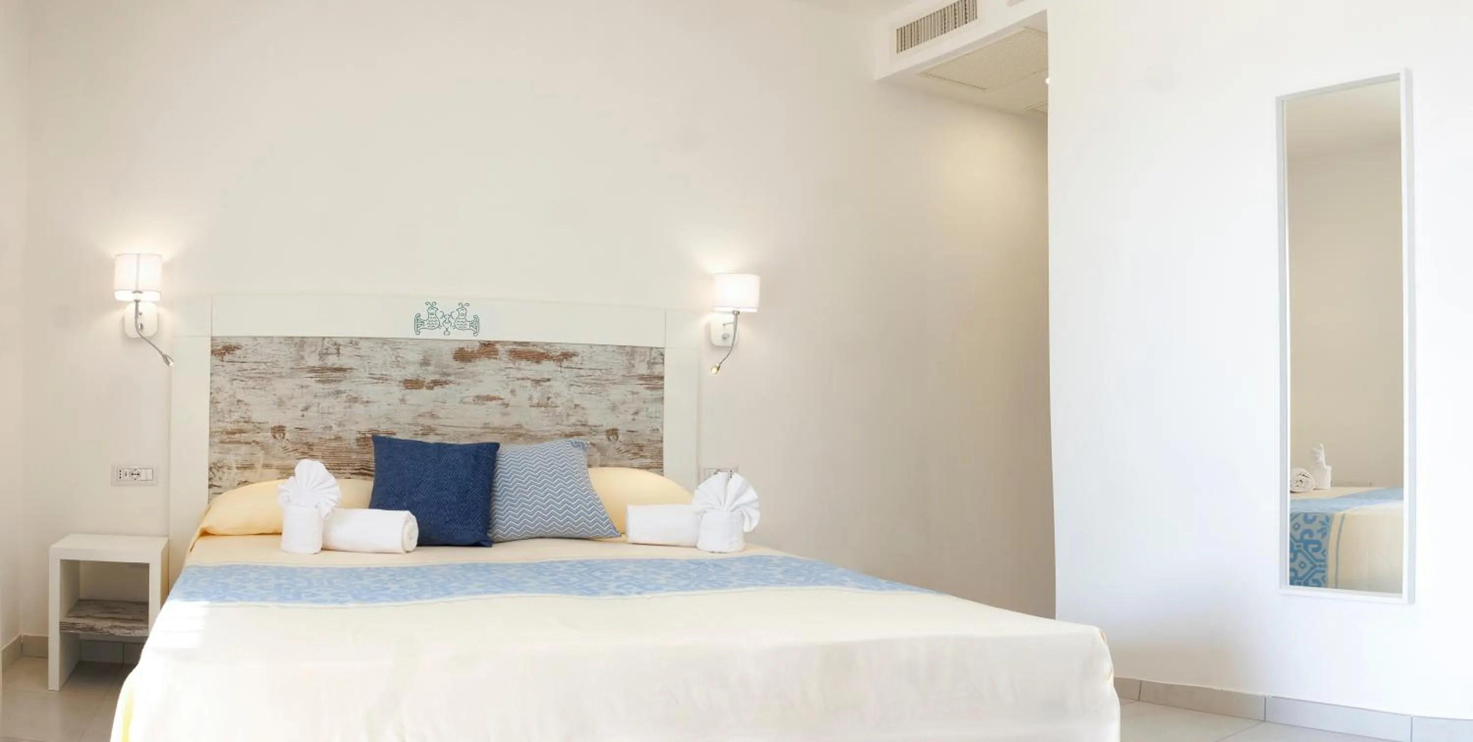 Bed in Mercury Beach Hotel