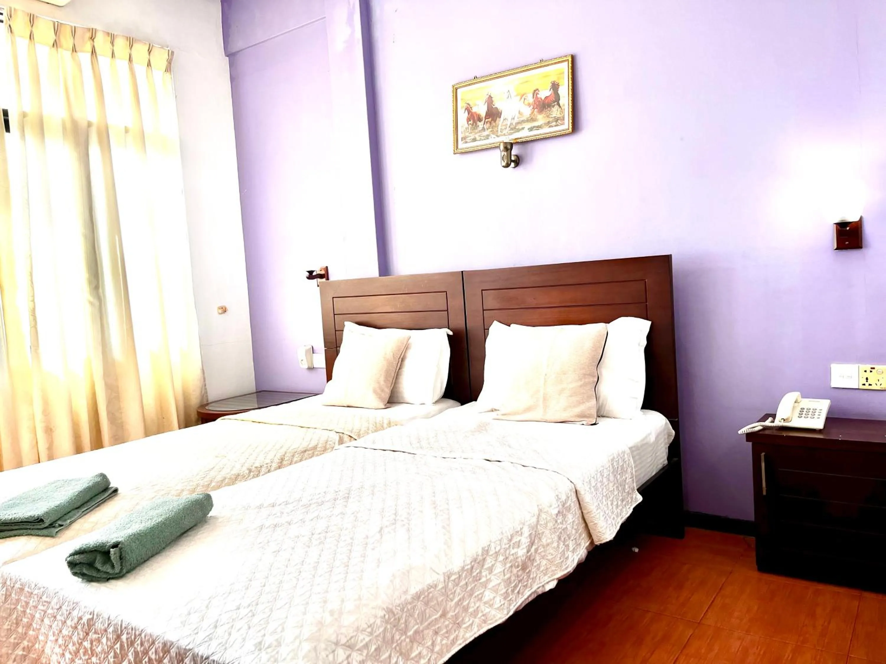 Bed in Subhas Tourist Hotel
