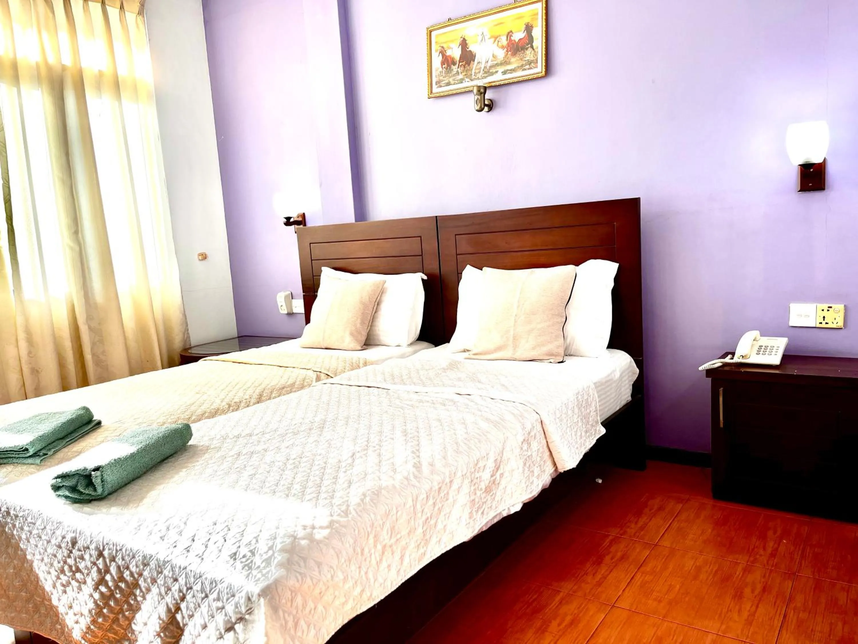 Bed in Subhas Tourist Hotel