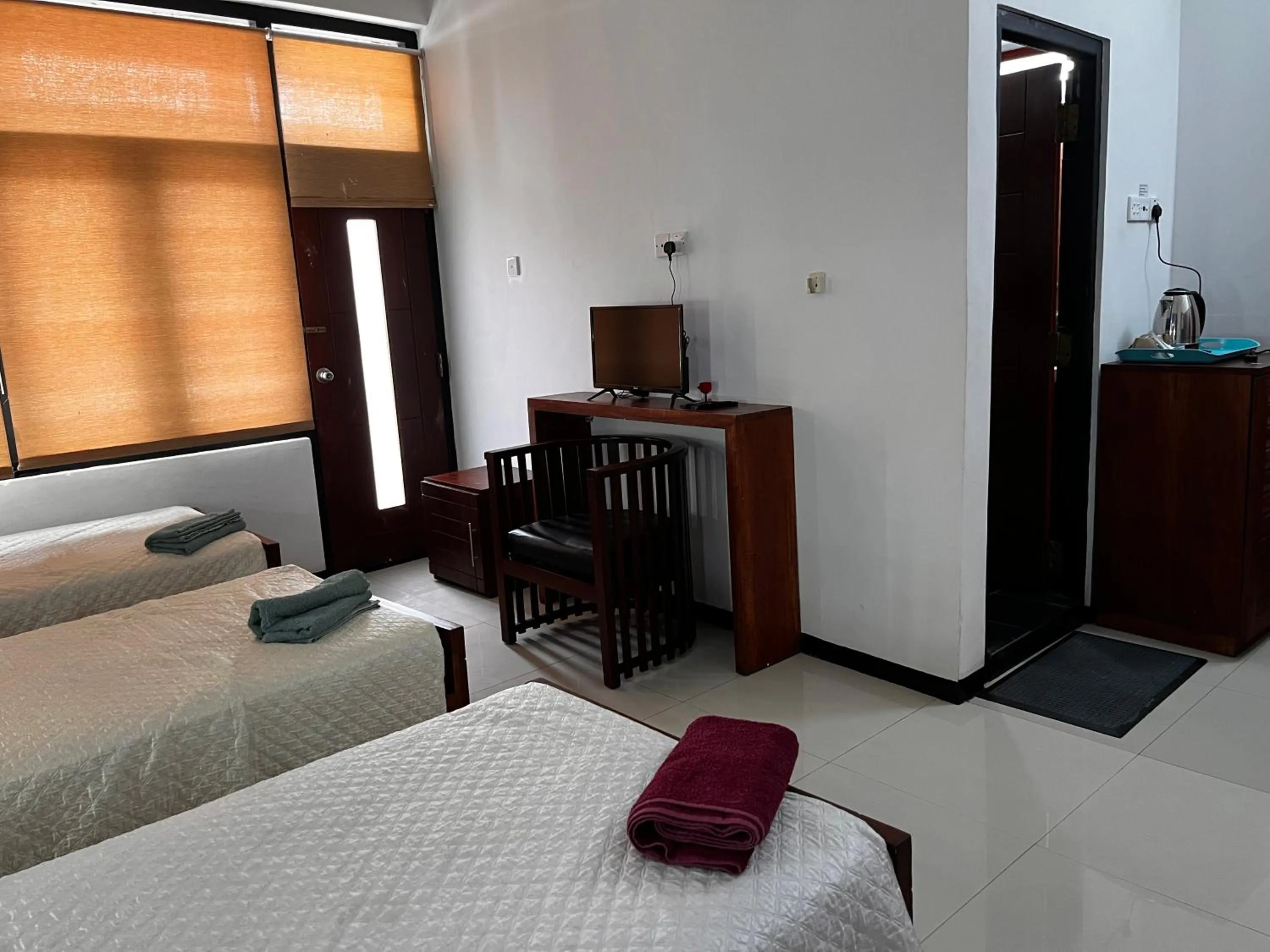 Bed in Subhas Tourist Hotel