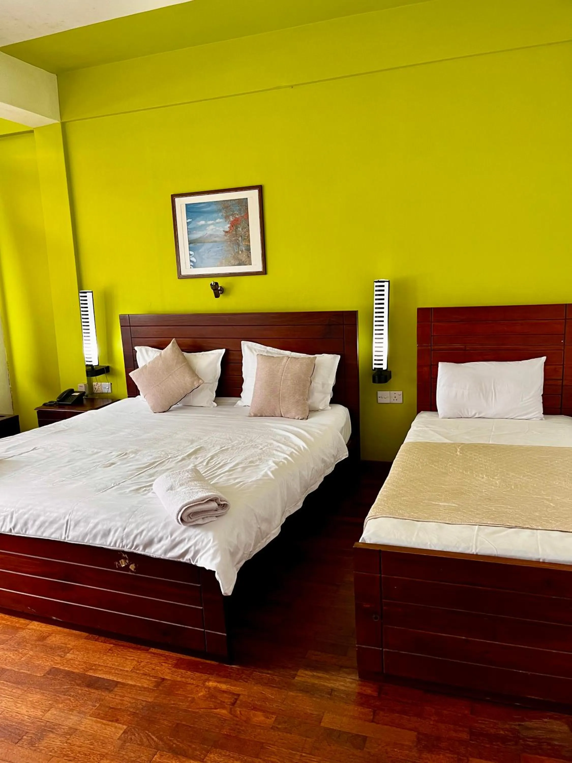 Bed in Subhas Tourist Hotel