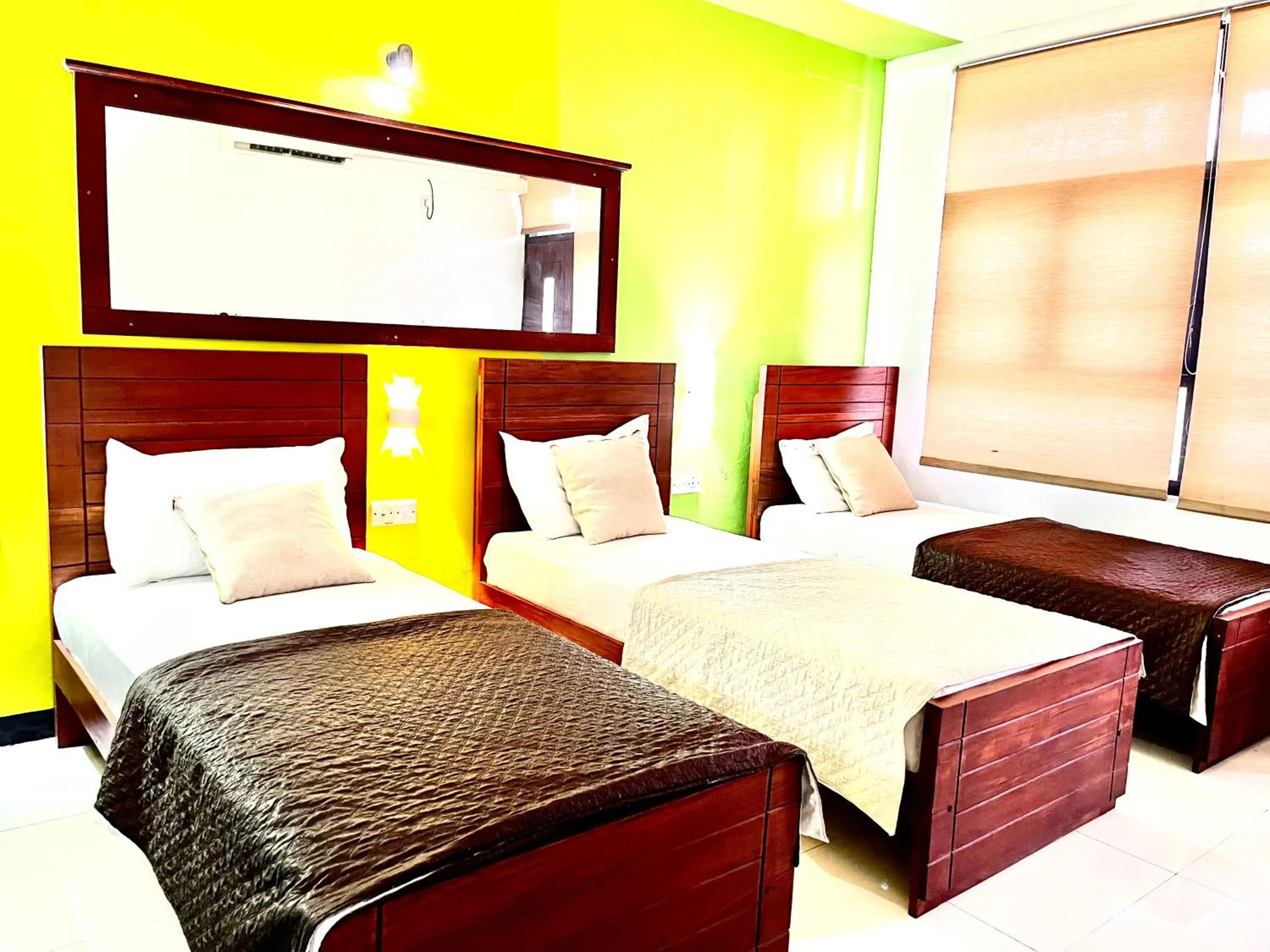 Bed in Subhas Tourist Hotel