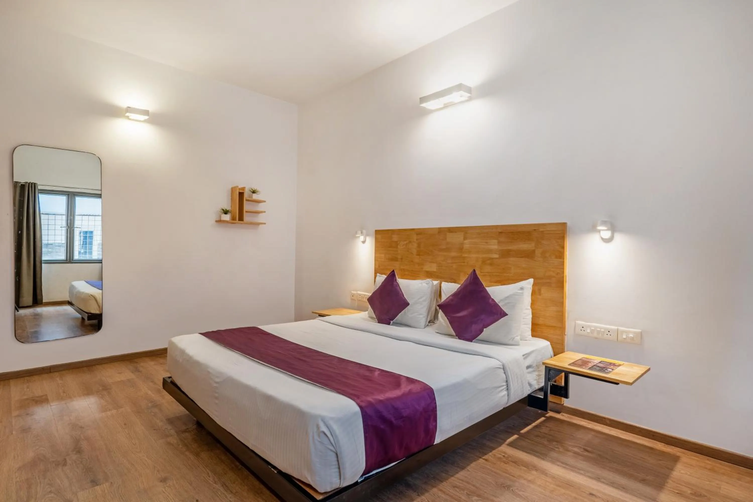 Bedroom in Monday Hotels Hitec City