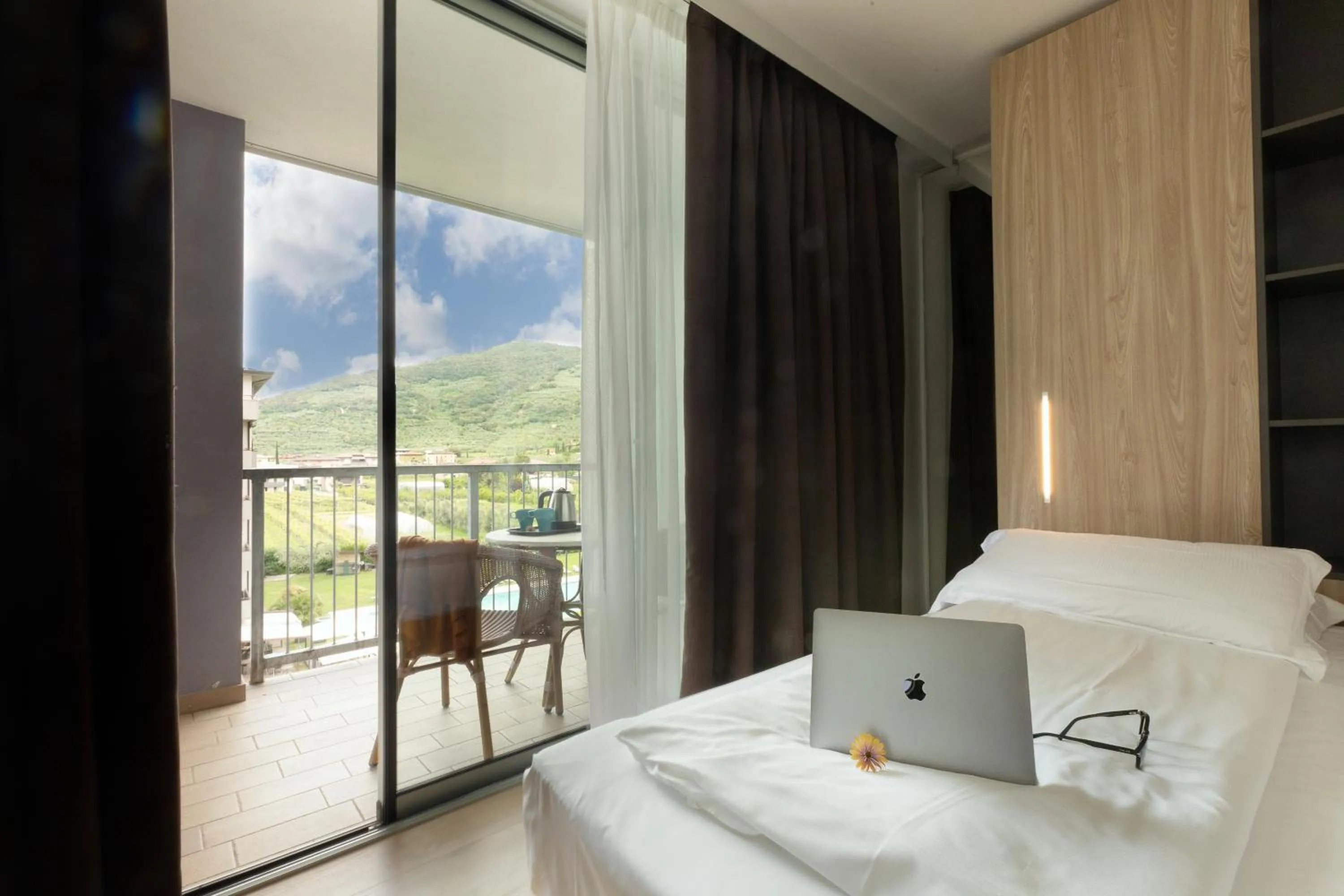 Bed in Ambassador Suite Hotel