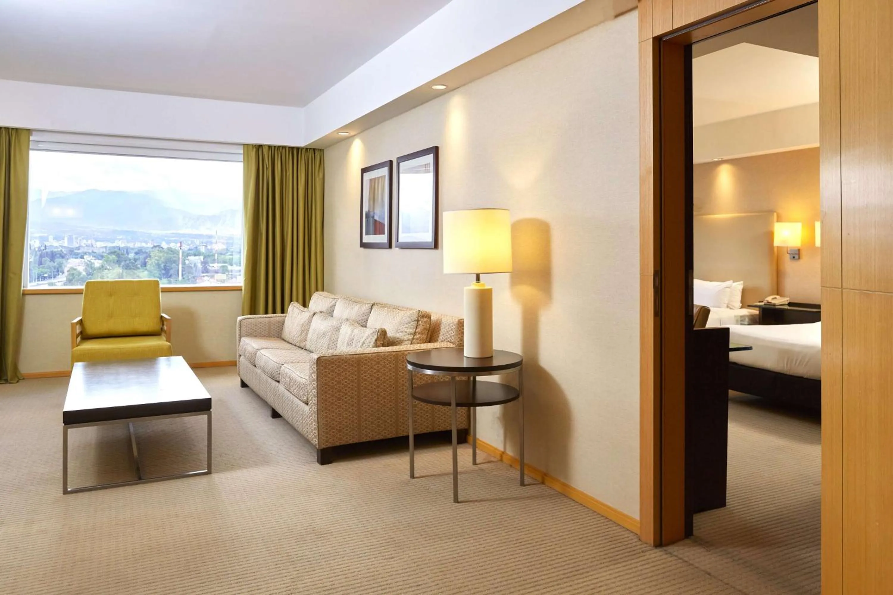 Living room, Bed in Hilton Mendoza