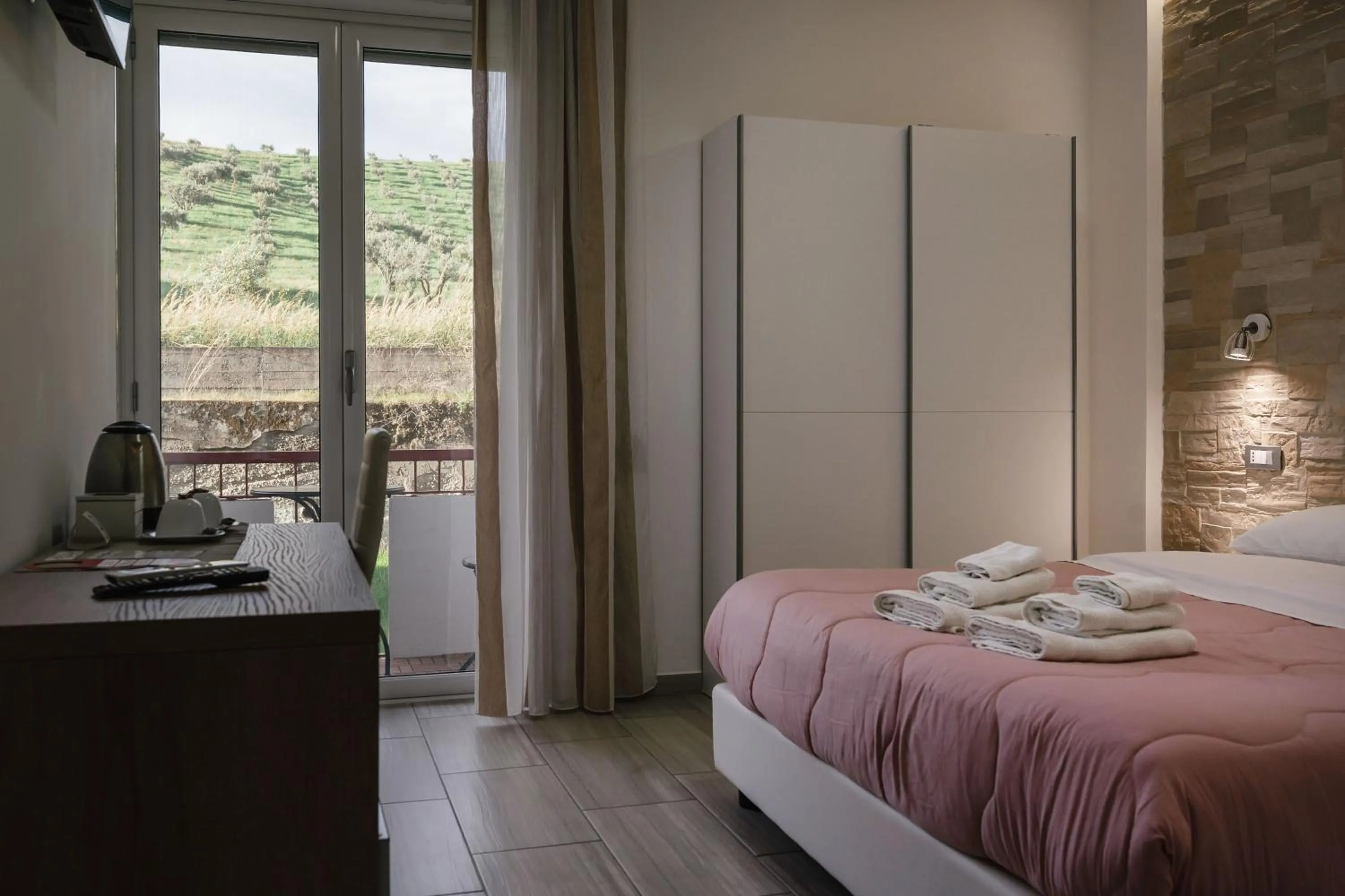 Bed in Zaro Suites B&B