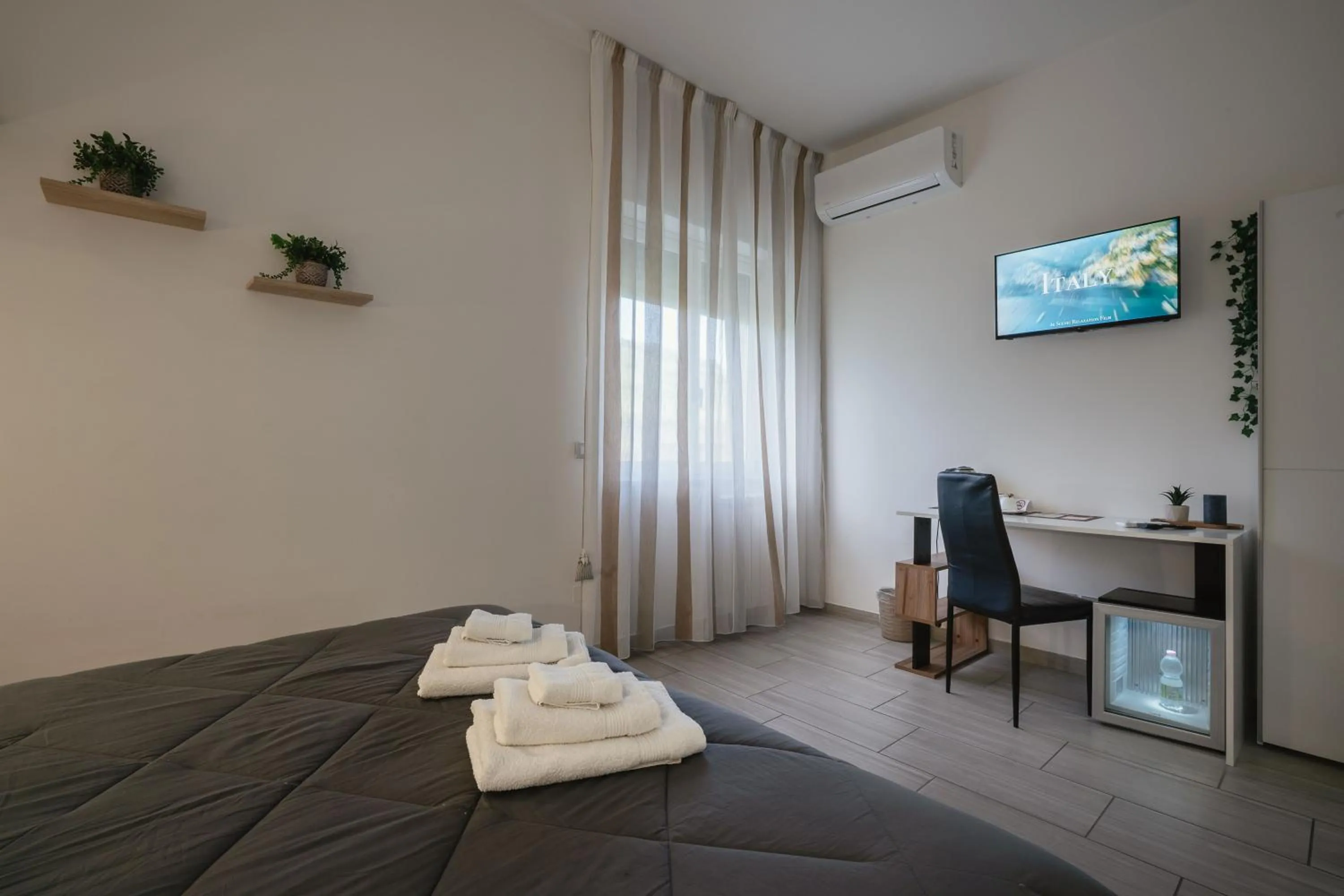 Bed in Zaro Suites B&B