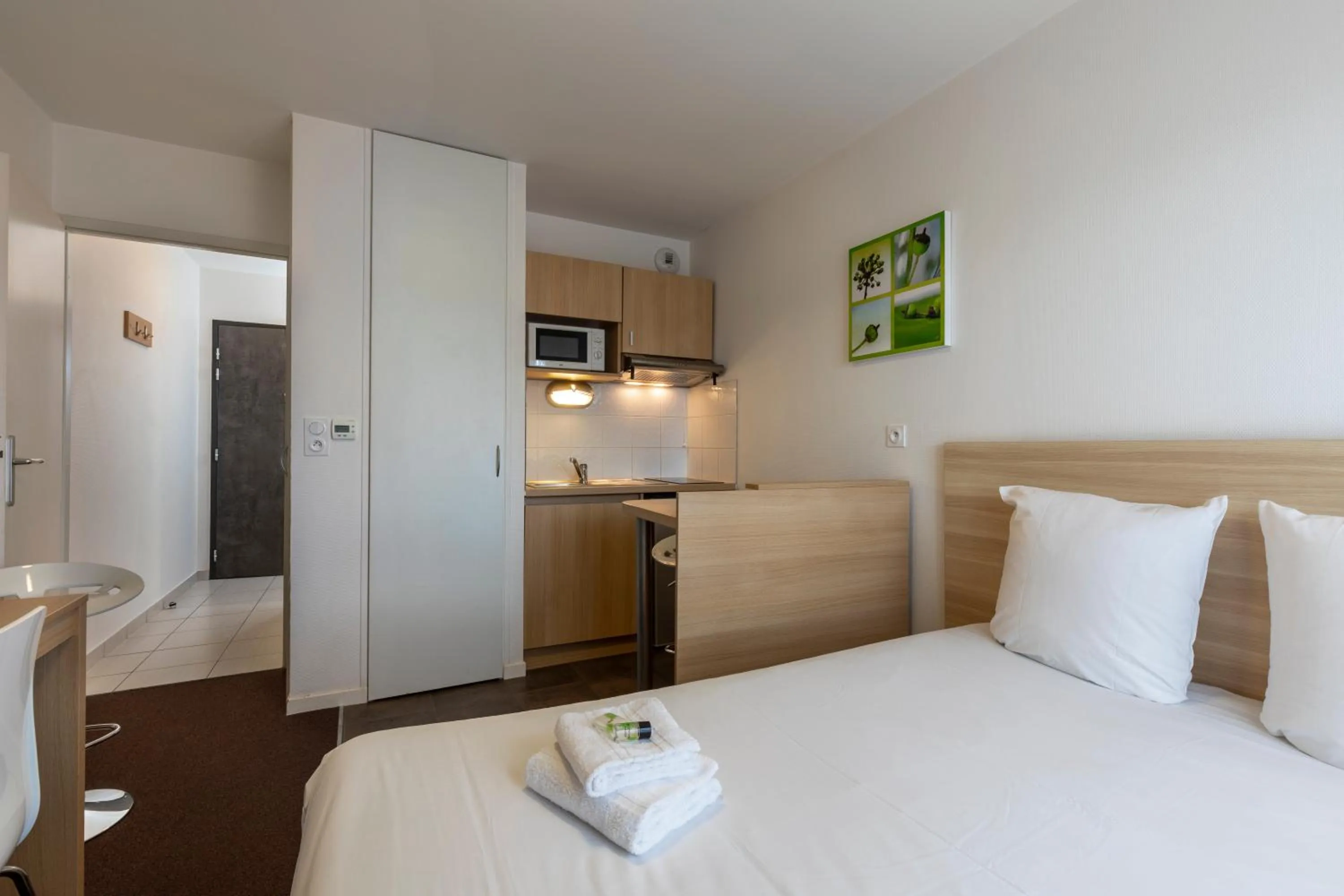 Kitchen or kitchenette in Kosy Appart'hotels Troyes City & Park