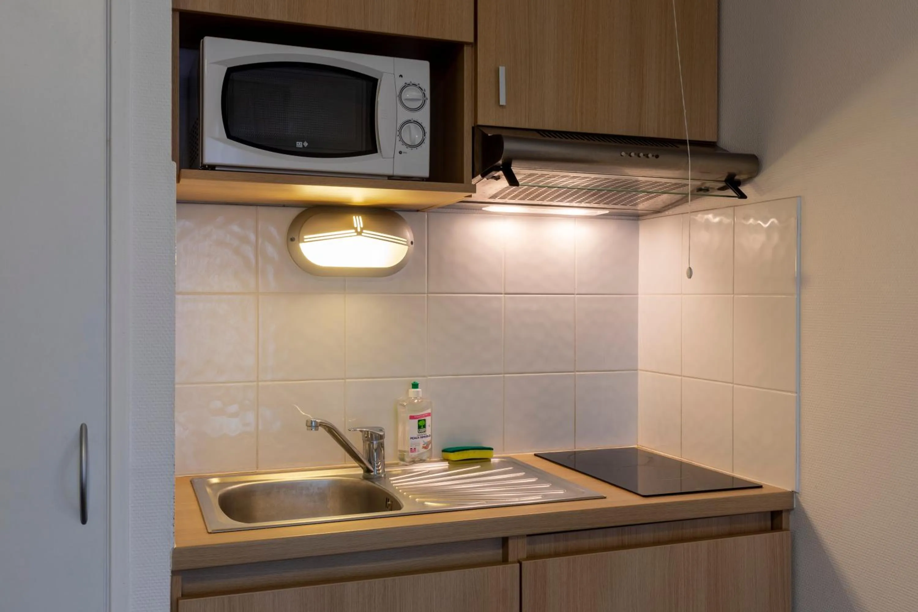 Kitchen or kitchenette in Kosy Appart'hotels Troyes City & Park
