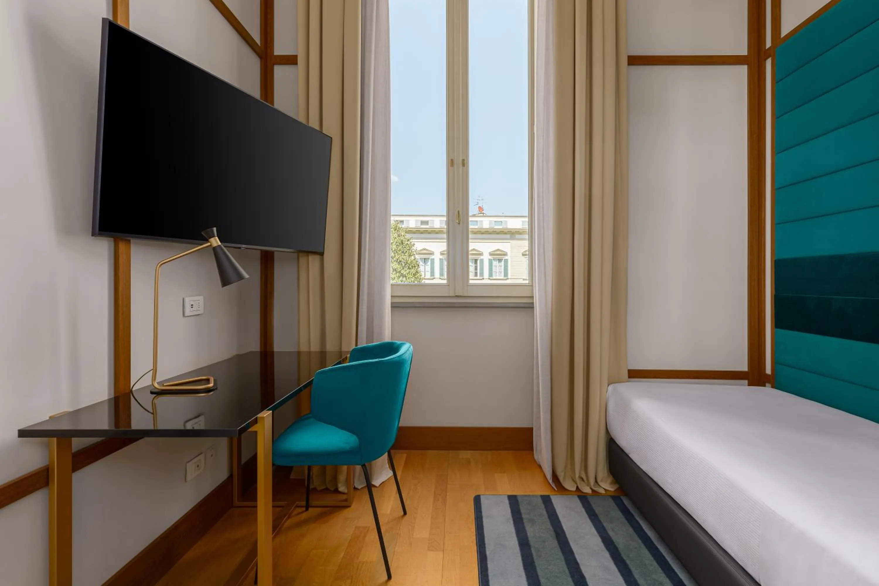 Bed in Room Mate Luca, Florence