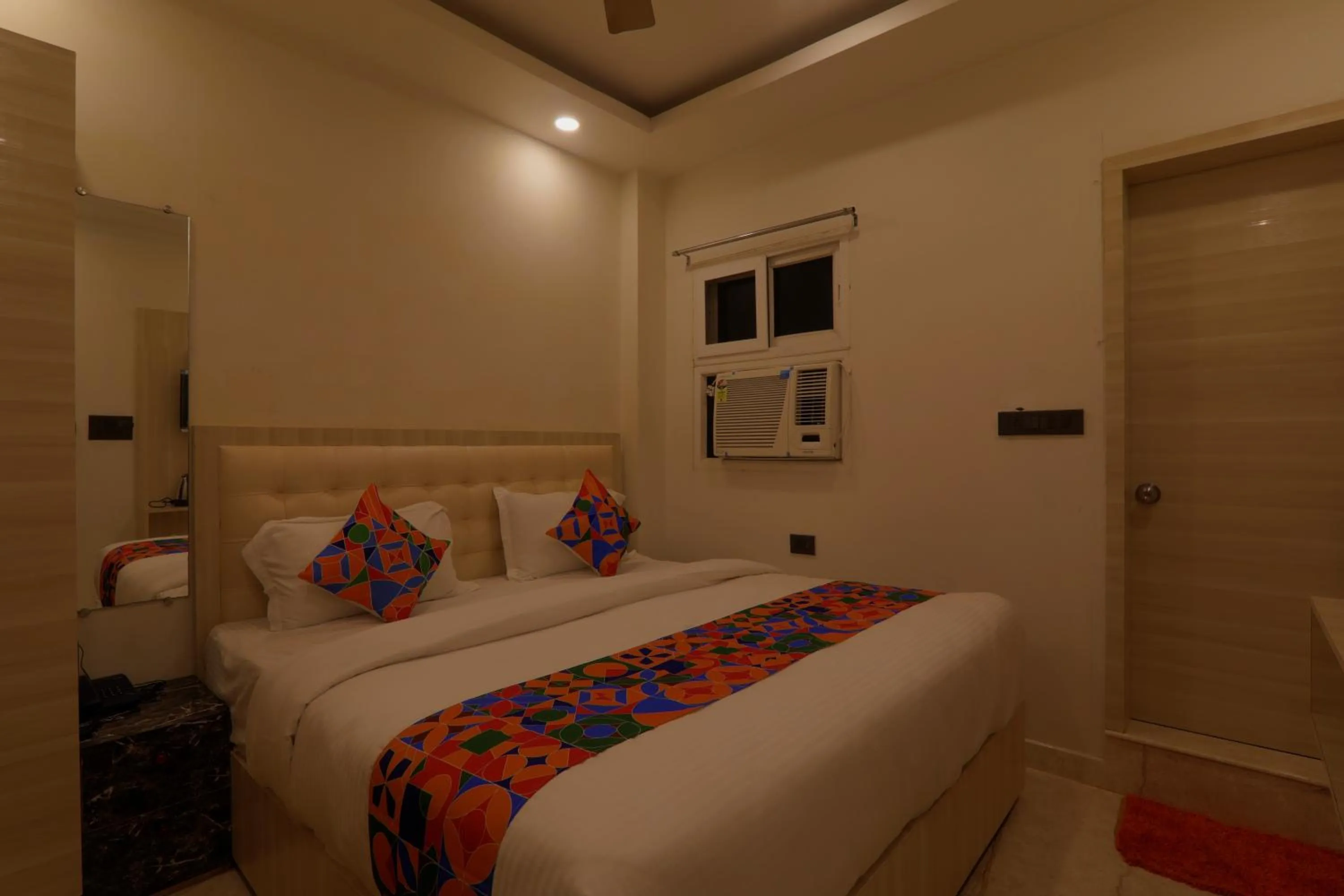 Photo of the whole room, Bed in Shri Tirupati Residency