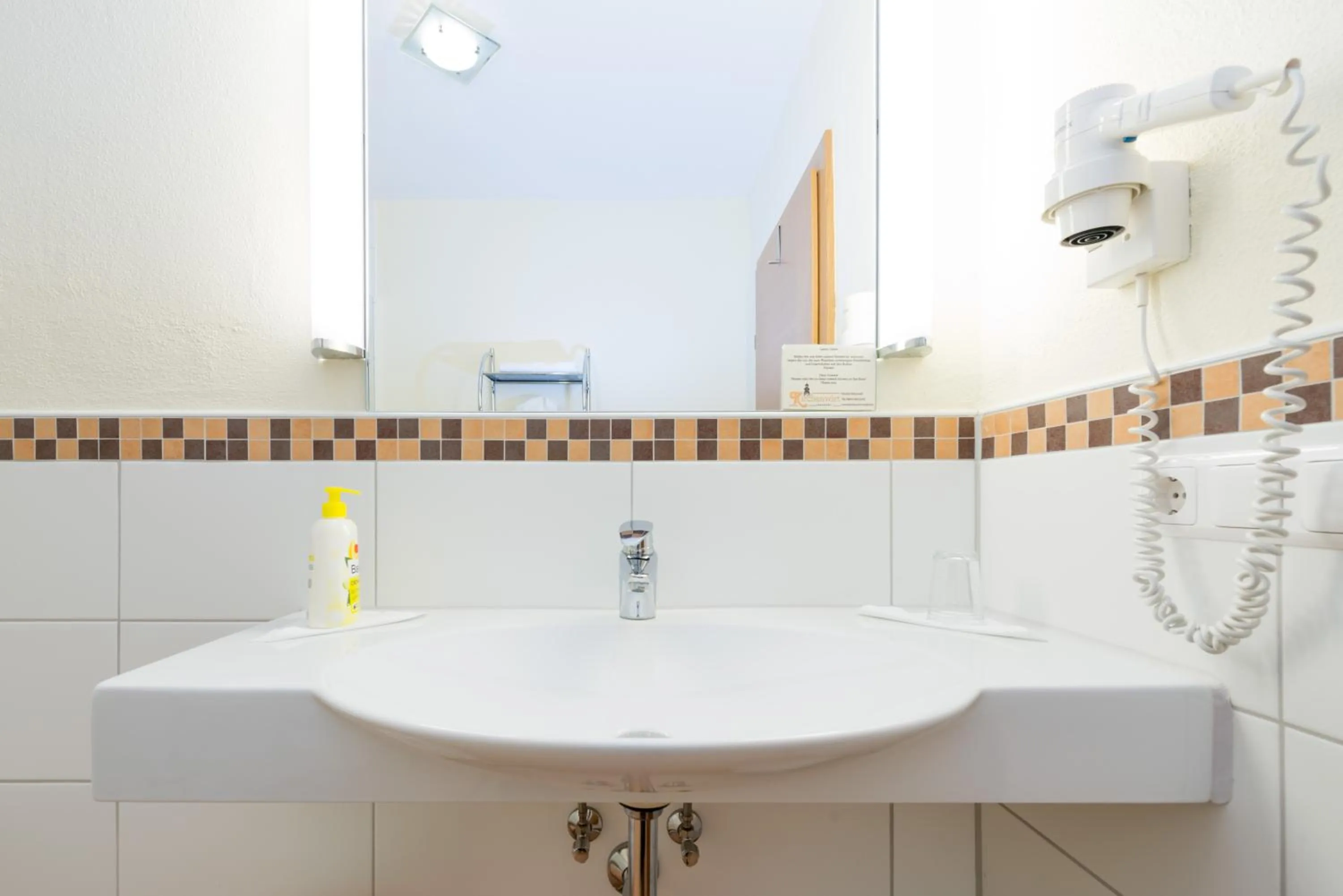 Bathroom in Kirchenwirt Irrsdorf Familie Schinwald