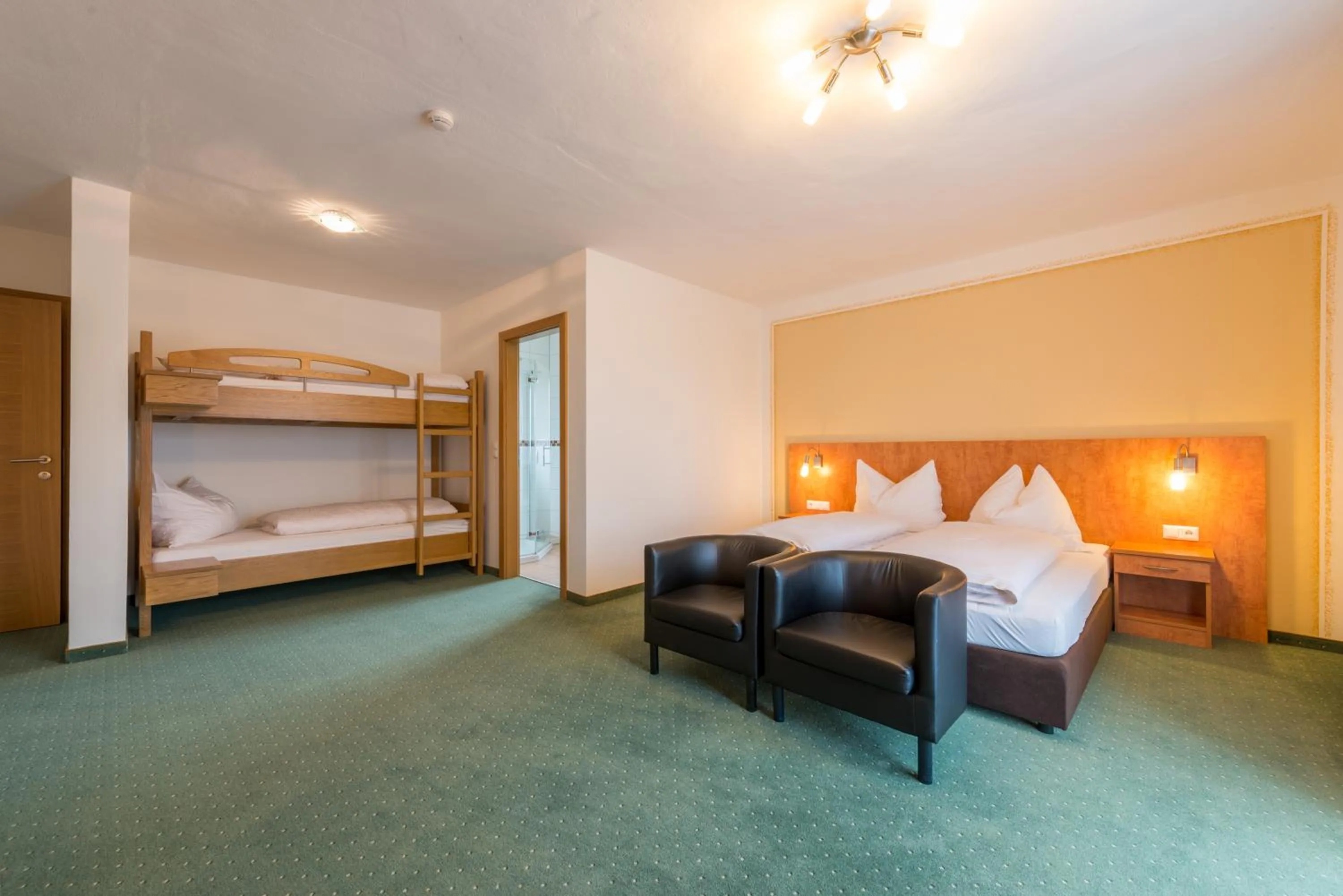 Photo of the whole room, Bed in Kirchenwirt Irrsdorf Familie Schinwald