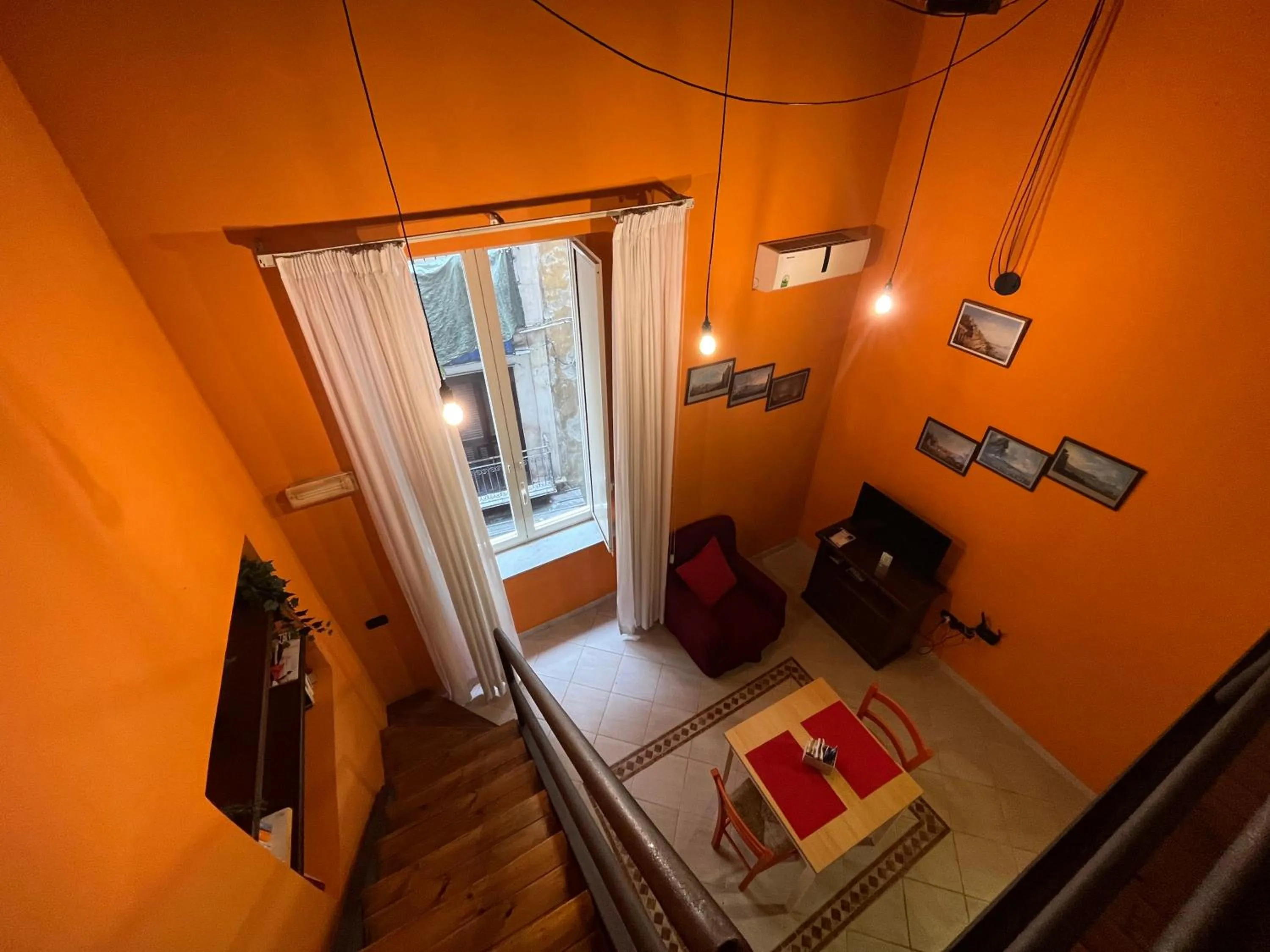 Living room, Bed in Case Così Apartments - Napoli