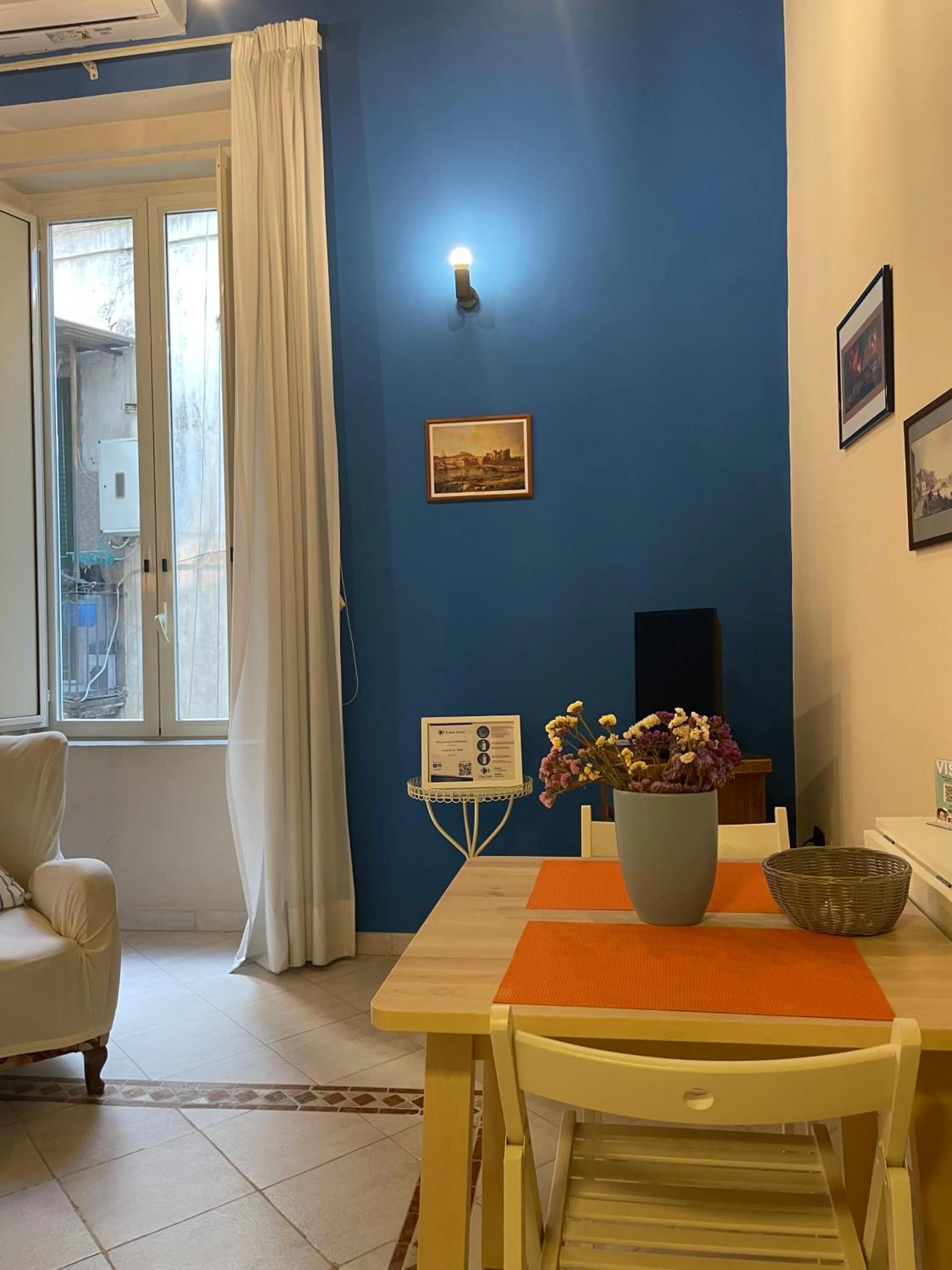 Photo of the whole room in Case Così Apartments - Napoli
