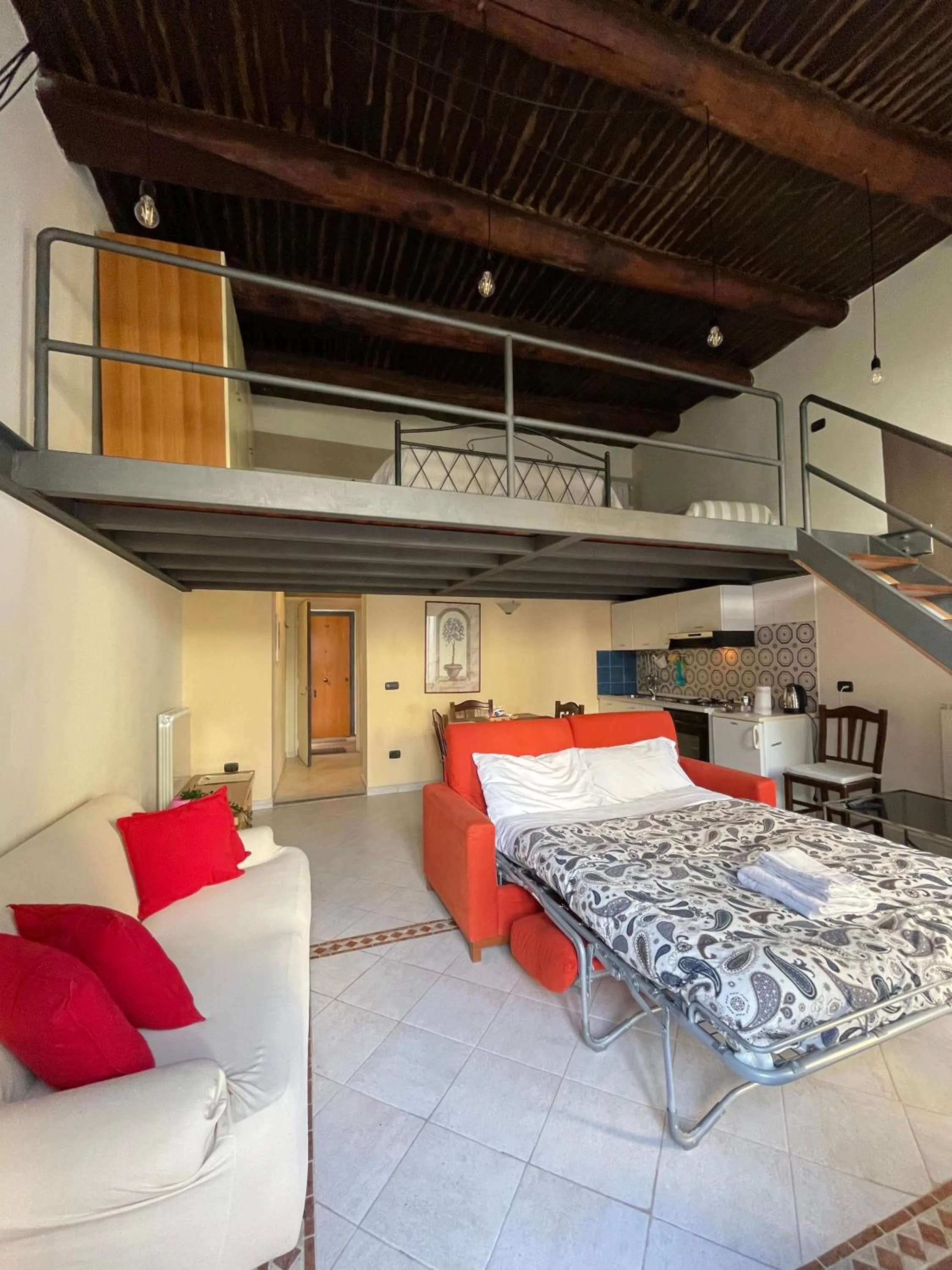 Photo of the whole room in Case Così Apartments - Napoli