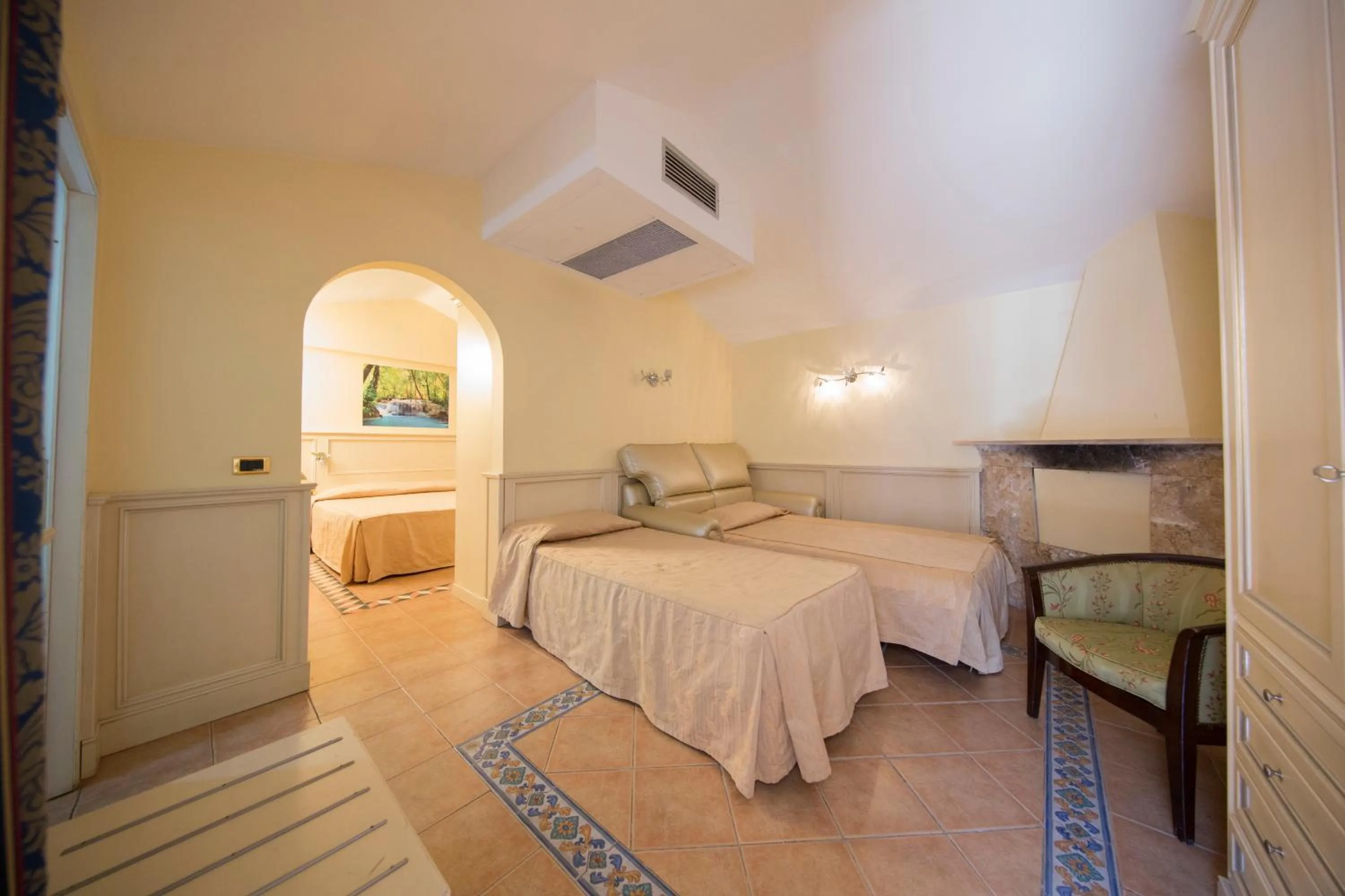 Photo of the whole room, Bed in Mancini Park Hotel