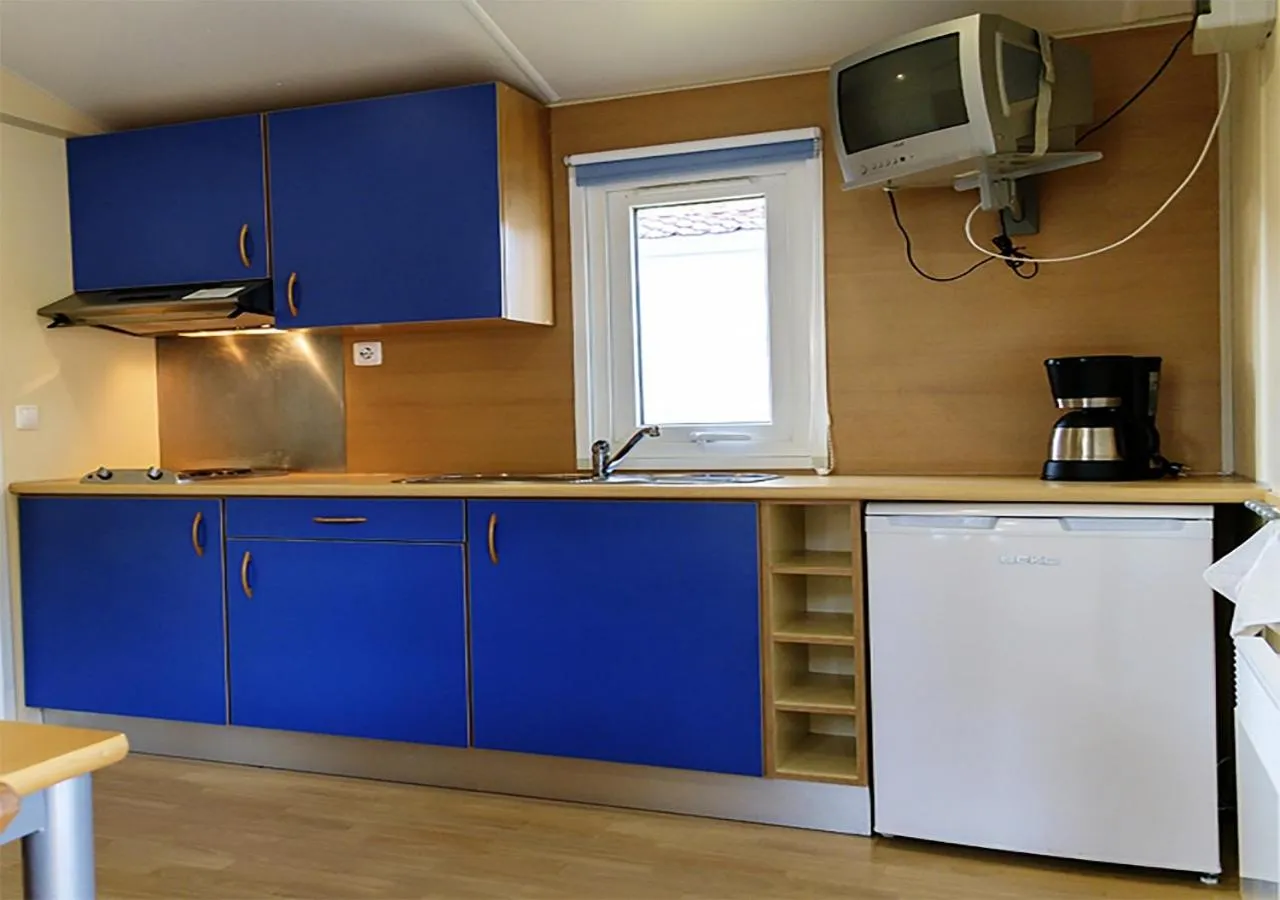 Kitchen or kitchenette in Parque De Campismo Orbitur Sao Pedro De Moel