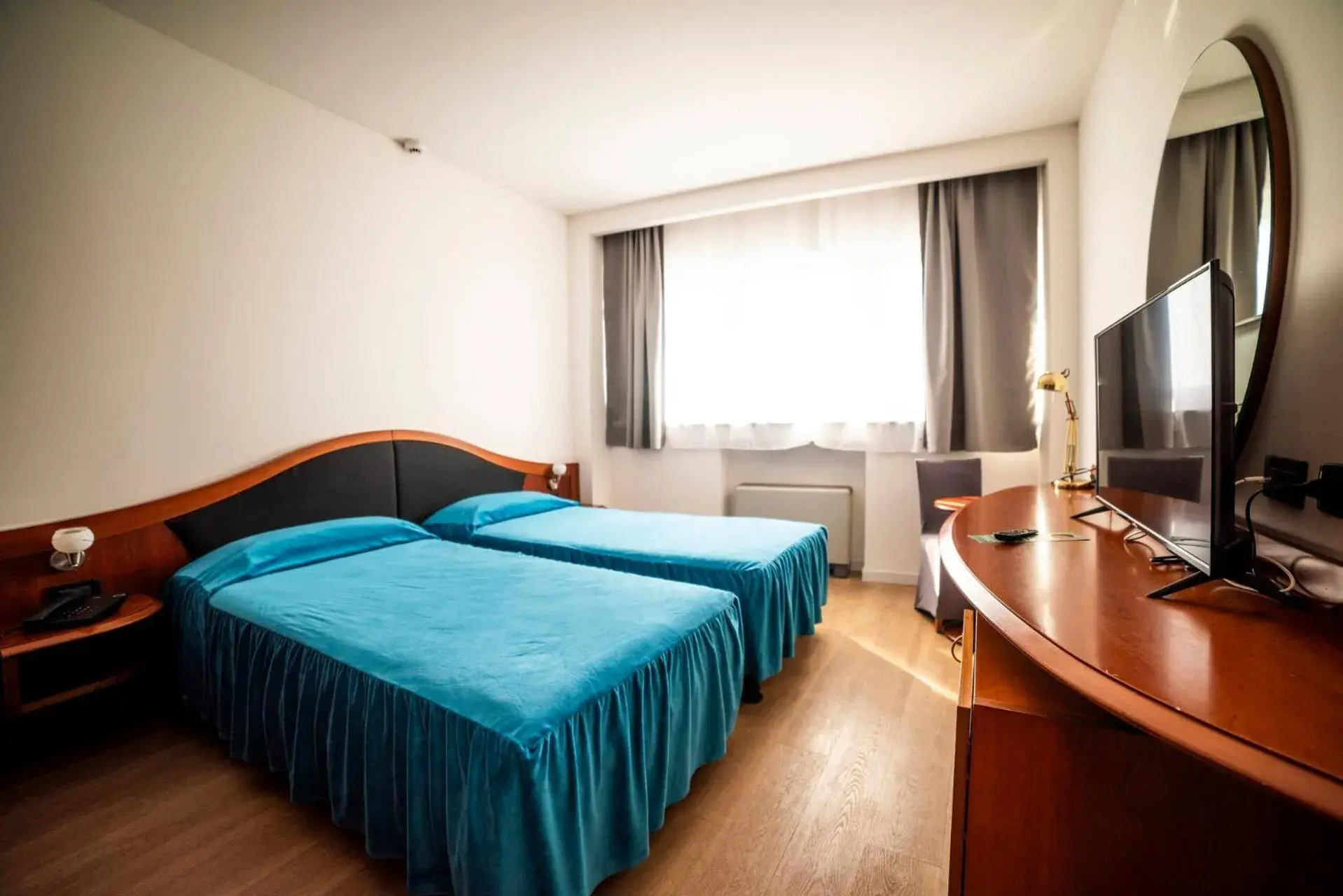 Twin Room in Hotel Donizetti Twin Room in Hotel Donizetti