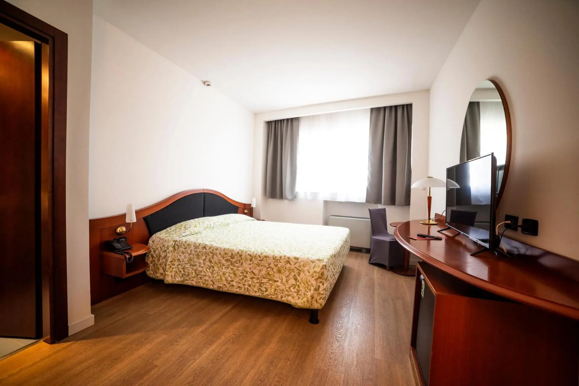 Bed in Hotel Donizetti